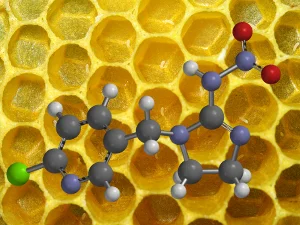comb and imadoclorid molecule.jpg