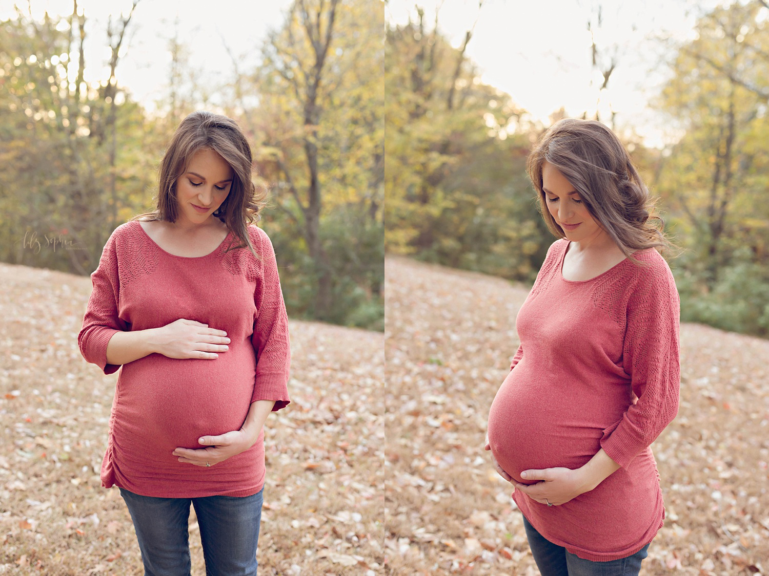  Image of a pregnant woman looking down and holding her belly while wearing a three quarters length red sweater and blue jeans, taken in an Atlanta Park. 