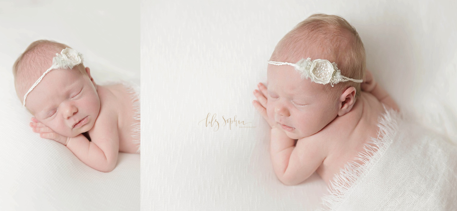 Portrait of newborn baby girl sleeping on her tummy on a white blanket in studio located in intown Atlanta 