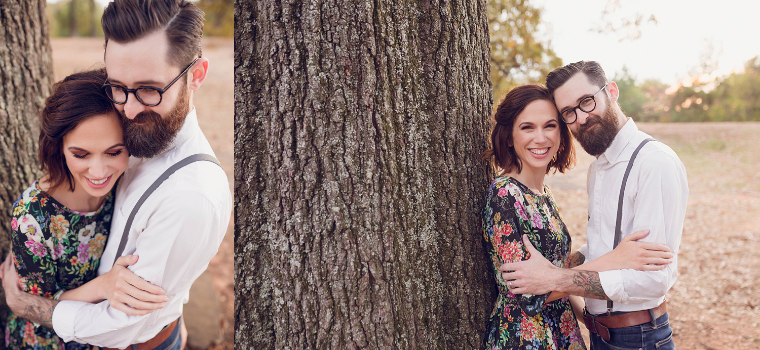  A mother wearing a floral maxi dress and a father wearing skinny jeans, white shirt, and suspenders embracing for some couples photos in Atlanta during their family session.&nbsp; 