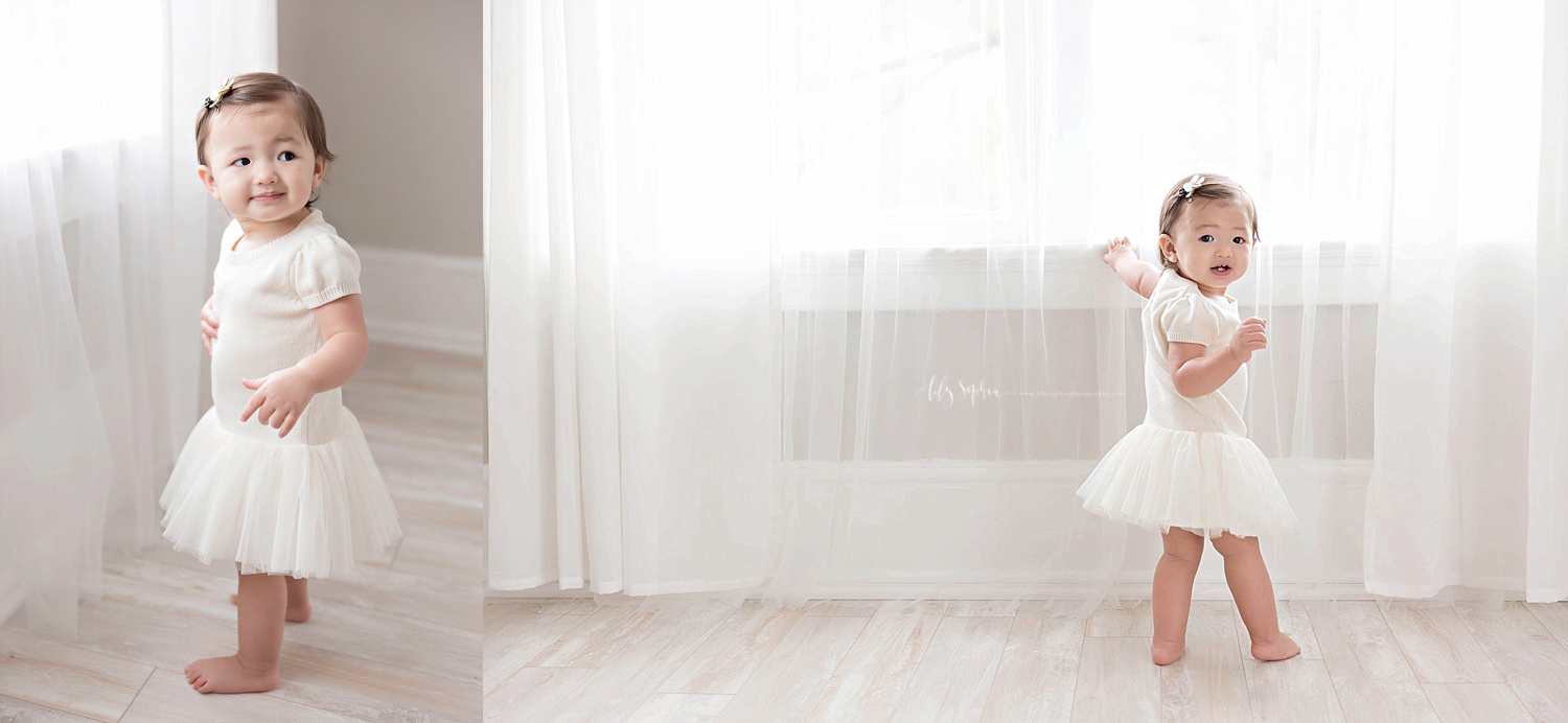  Side by side images of an Asian, baby, girl standing in front of a window, wearing a tutu.&nbsp; 