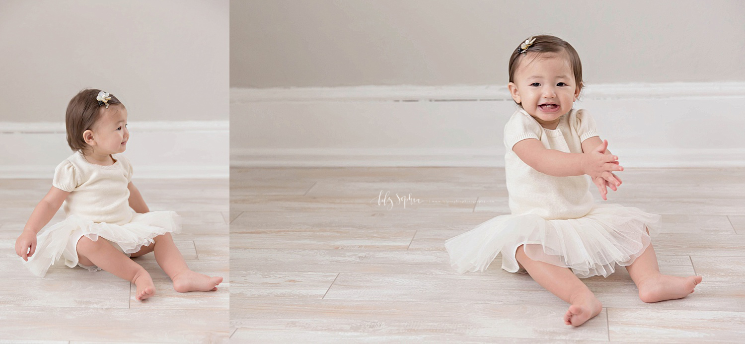  Side by side images of an Asian, baby, girl, sitting on the floor, wearing a tutu, cream shirt and a flower clip in her hair.&nbsp; 