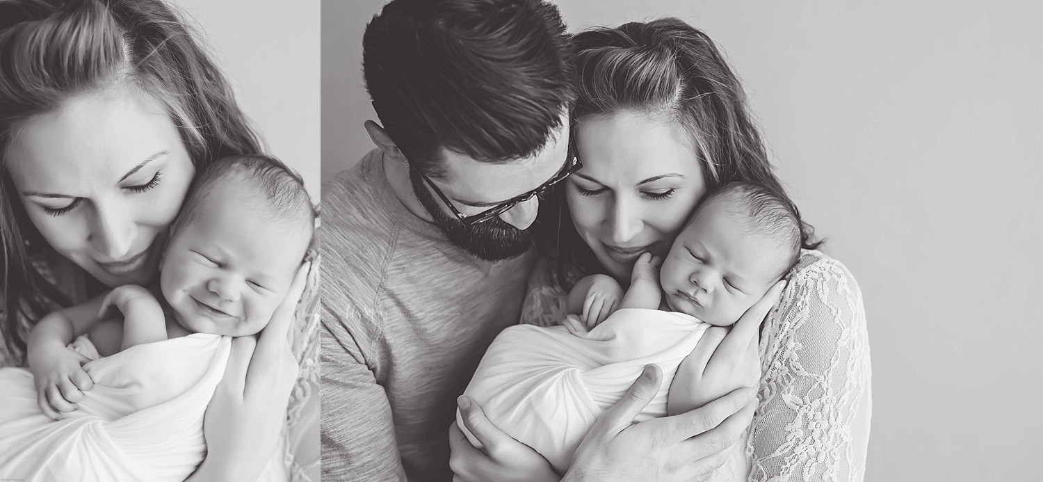  Side by side black and white images. In the first image, the mother is holding her sleeping newborn son, who is smiling. In the second image, the mother is holding her sleeping, newborn son and her husband is holding them both.&nbsp; 