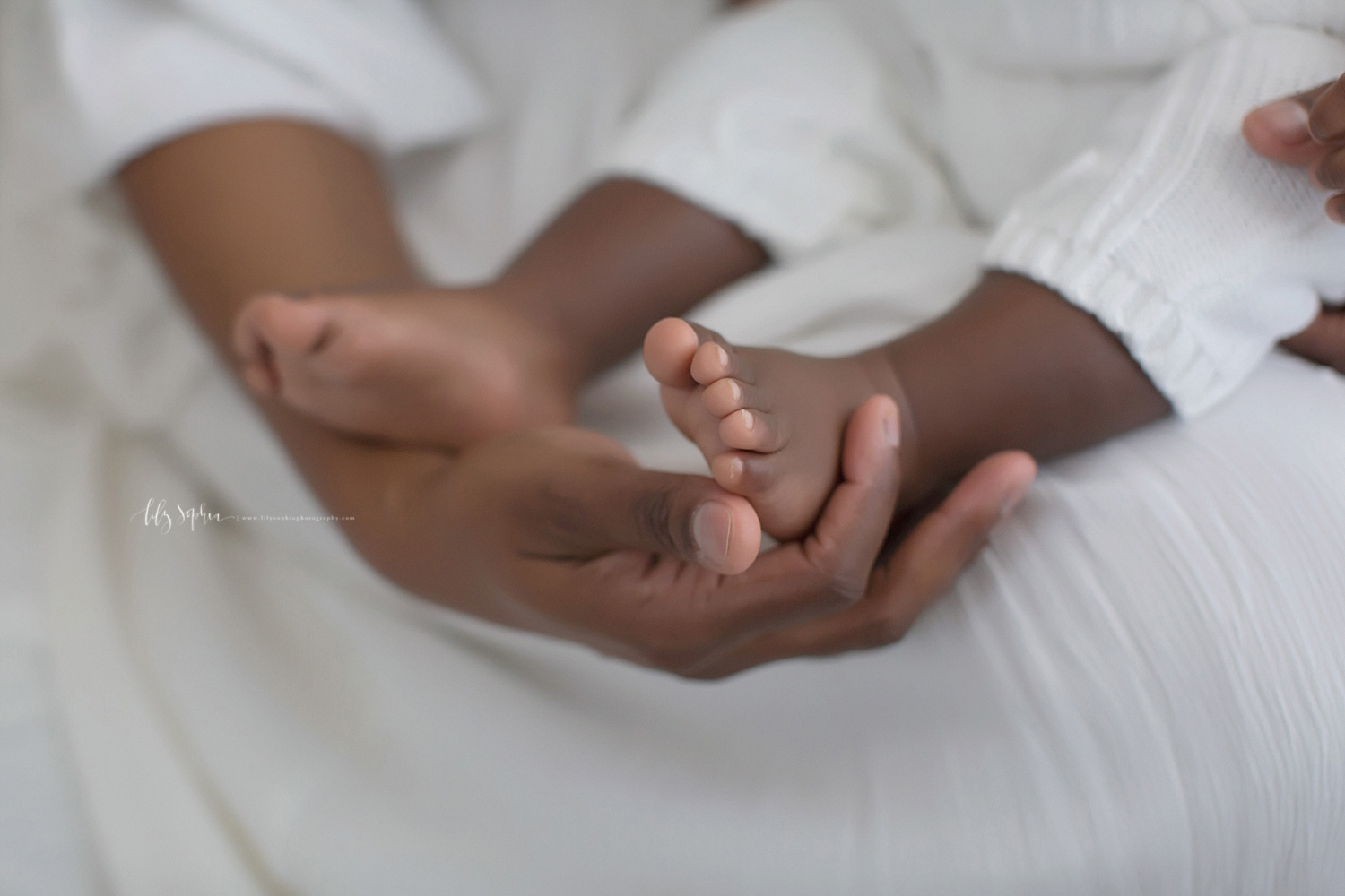  Close up image of sweet, baby boy toes.  