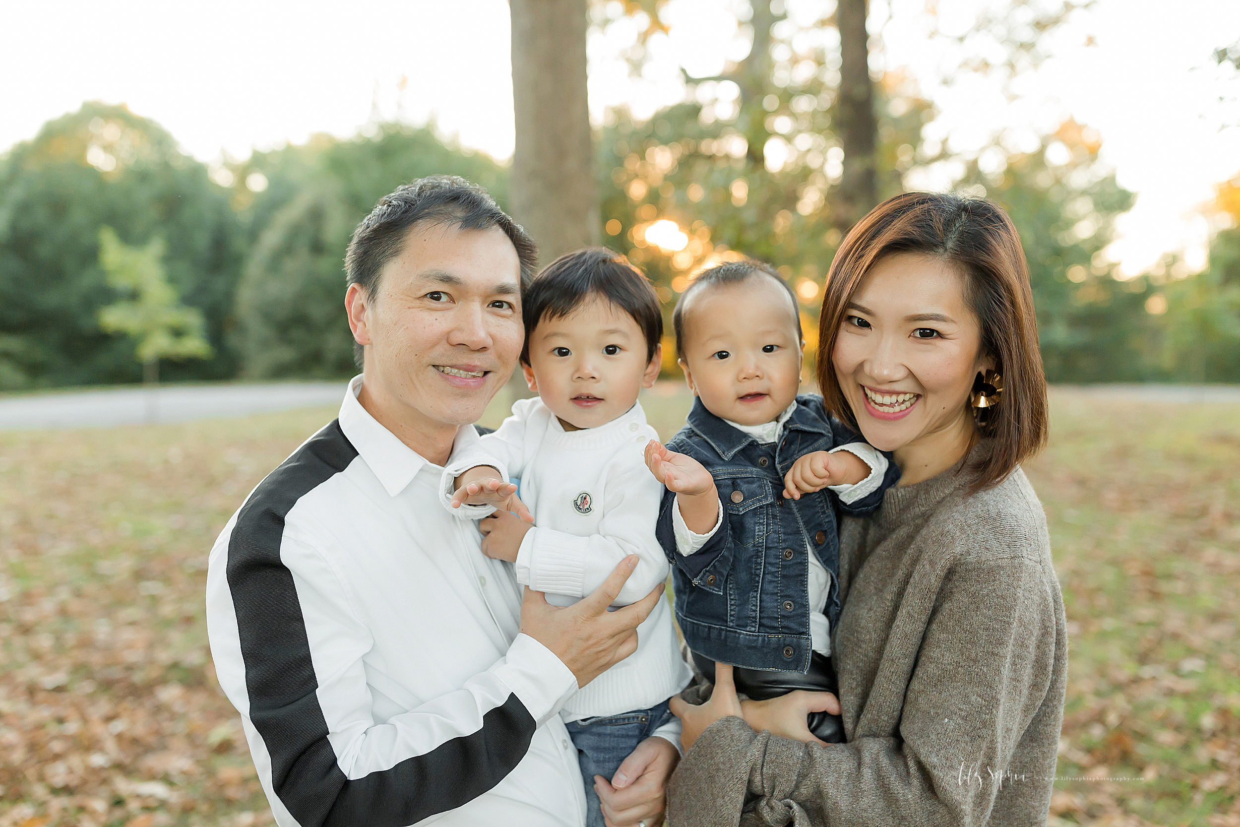 atlanta-buckhead-brookhaven-decatur-lily-sophia-photography--photographer-portraits-grant-park-intown-park-sunset-first-birthday-cake-smash-one-year-old-outdoors-cool-asian-american-family_0083.jpg