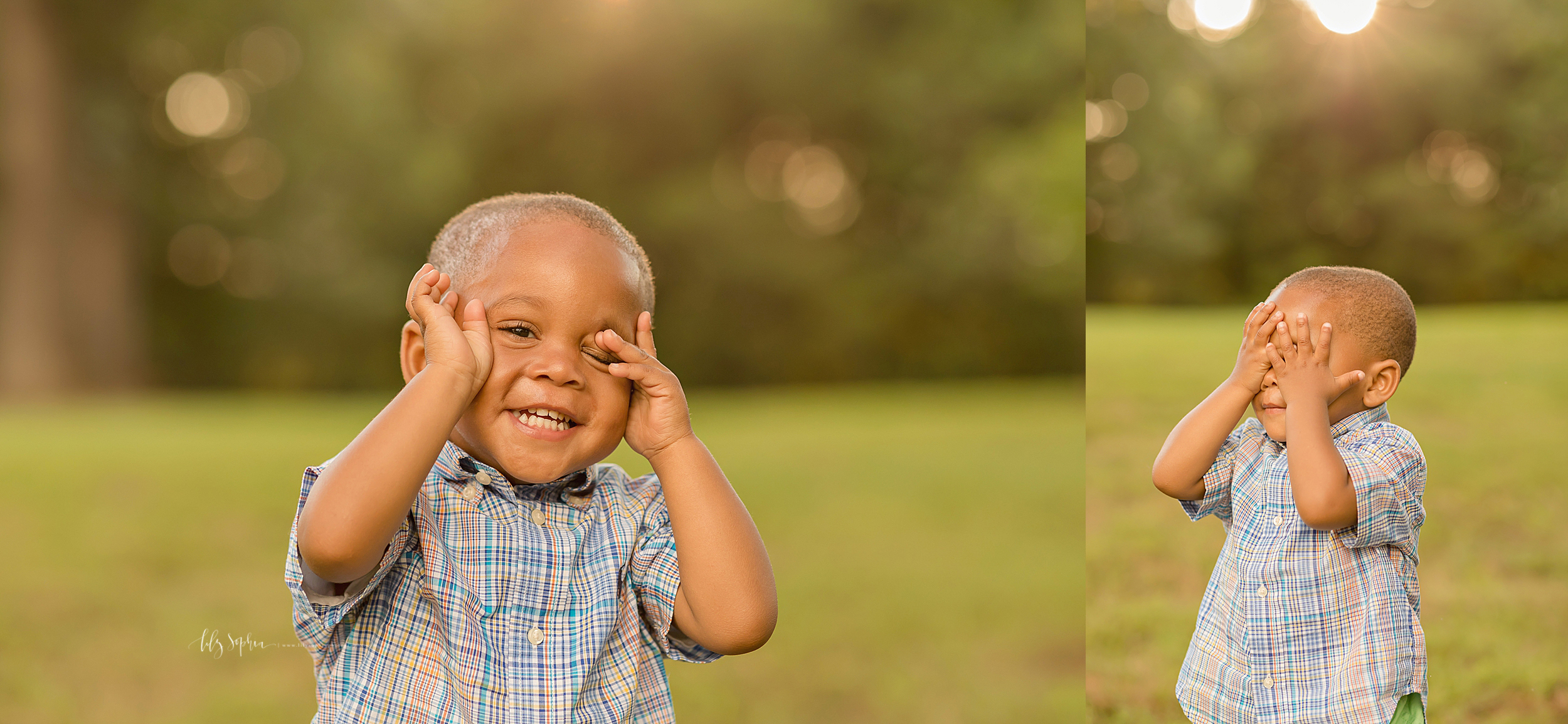  Image of an African American two year old playing peek-a-boo in a park.  He is wearing a blue and tan buttoned down short sleeved shirt and lime green pants. 