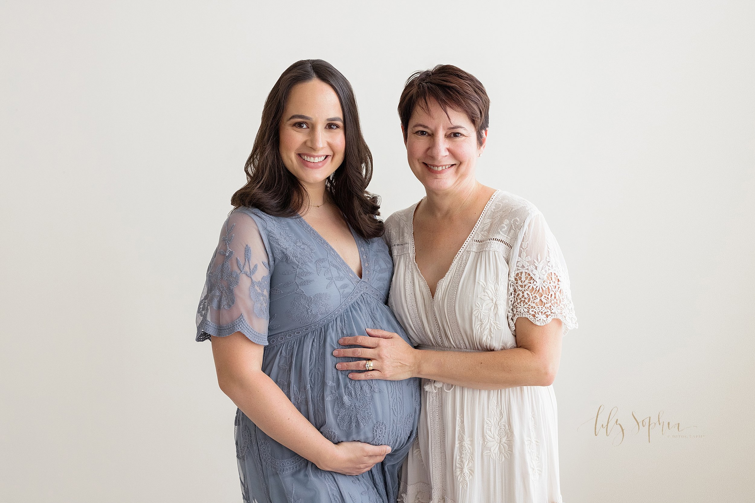  Maternity session with an expectant mother and her mother, the baby’s grandmother, taken in a studio near Poncey Highlands in Atlanta using natural light. 