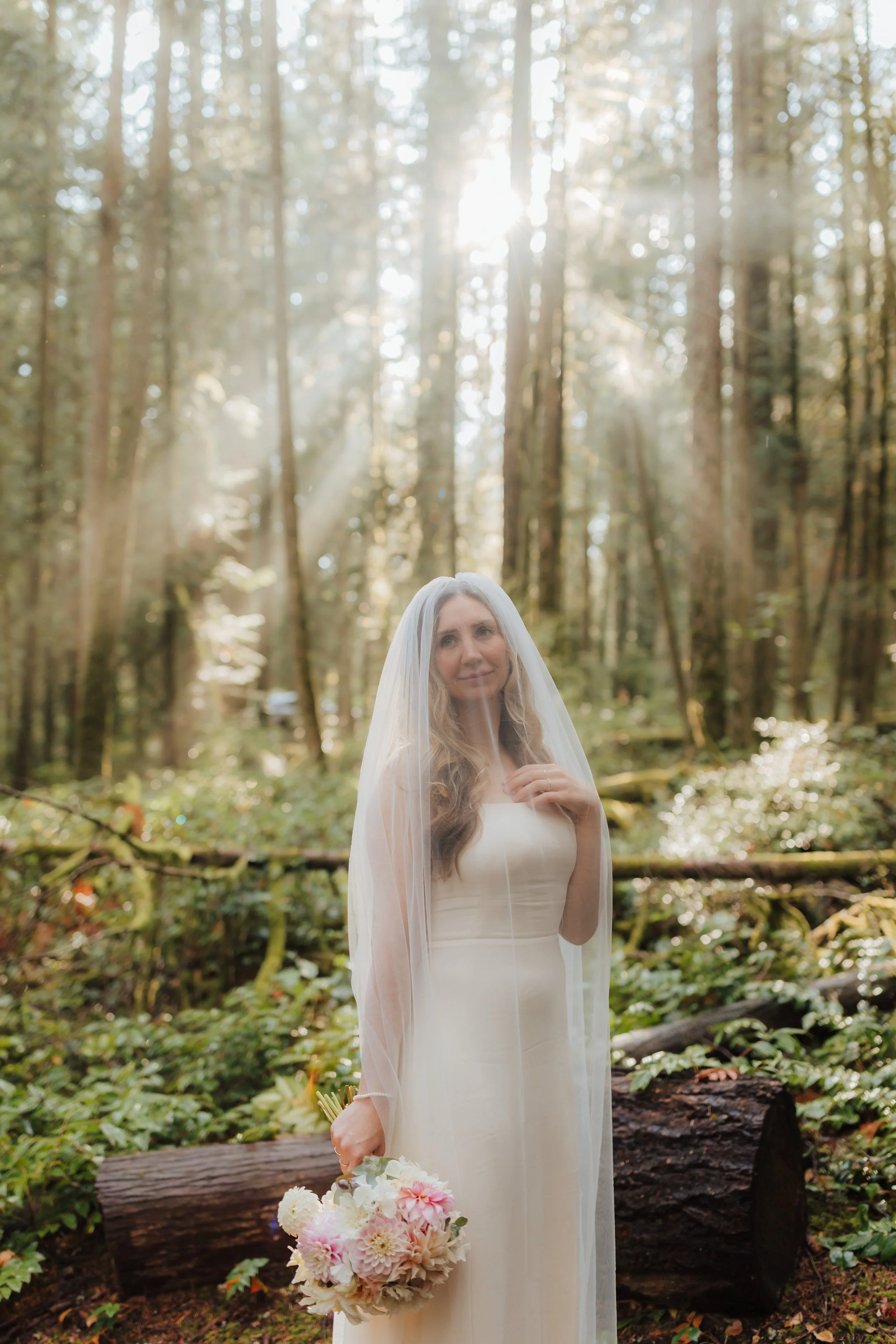 Bride in the rainforest at Cliff Gilker Park in Roberts Creek