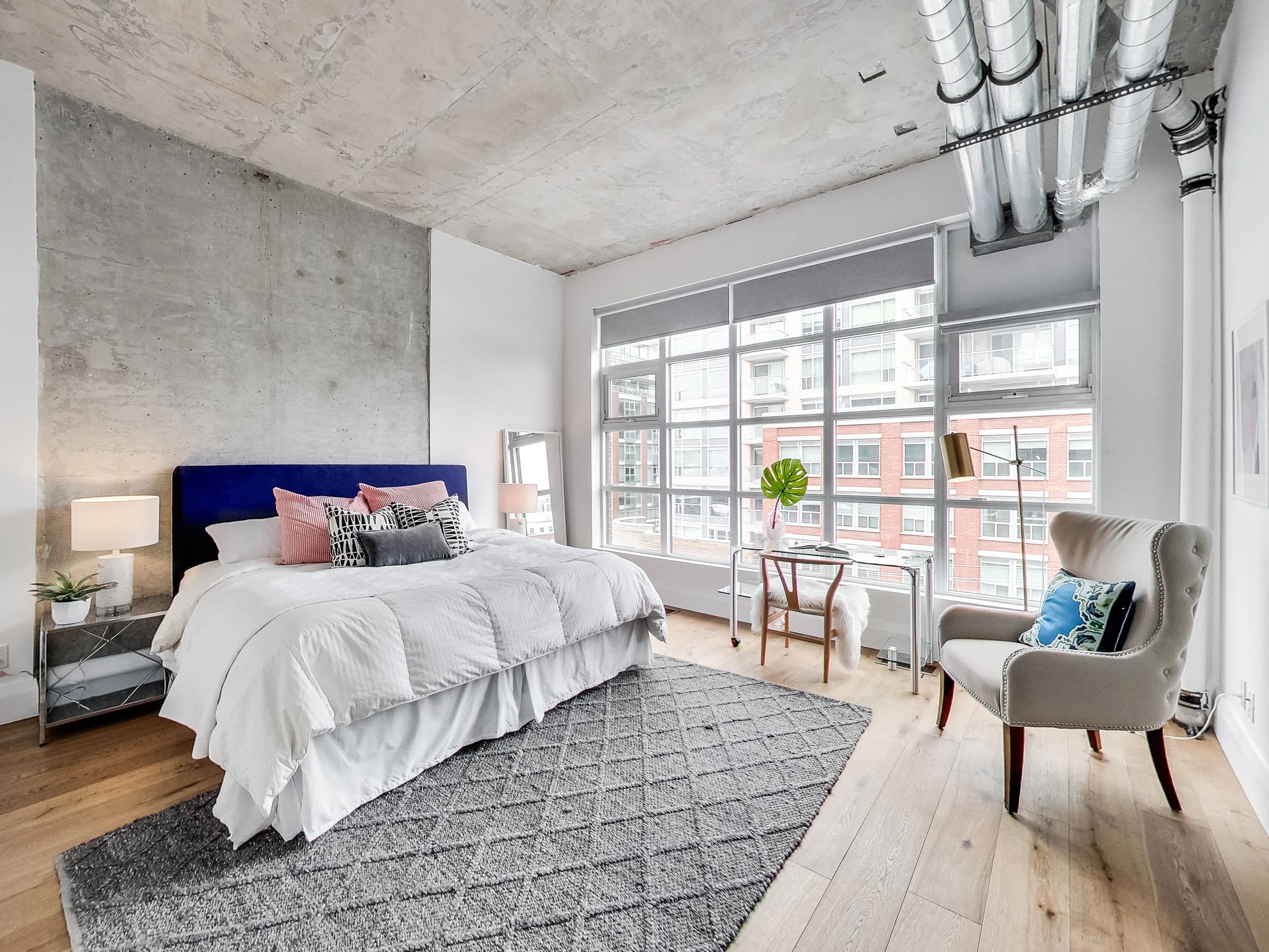 The master bedroom. I wouldn't mind waking up to this beautiful view of King Street East. There's something about old red bricked buildings that's so comforting. 
