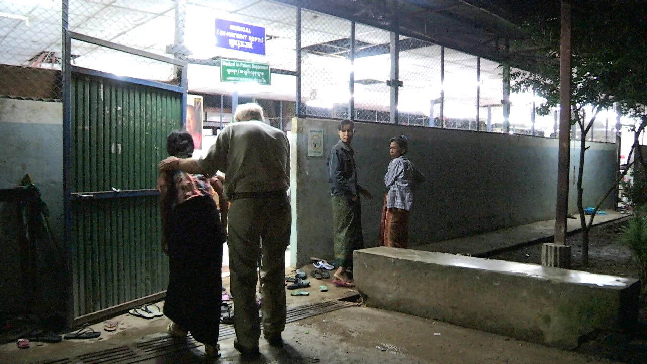 Medical assistance is only possible at the Mae Sot clinic, a 30 minute drive from the dump. Fred Stockwell, from 'Eyes to Burma' makes one of his daily clinic trips with a patient