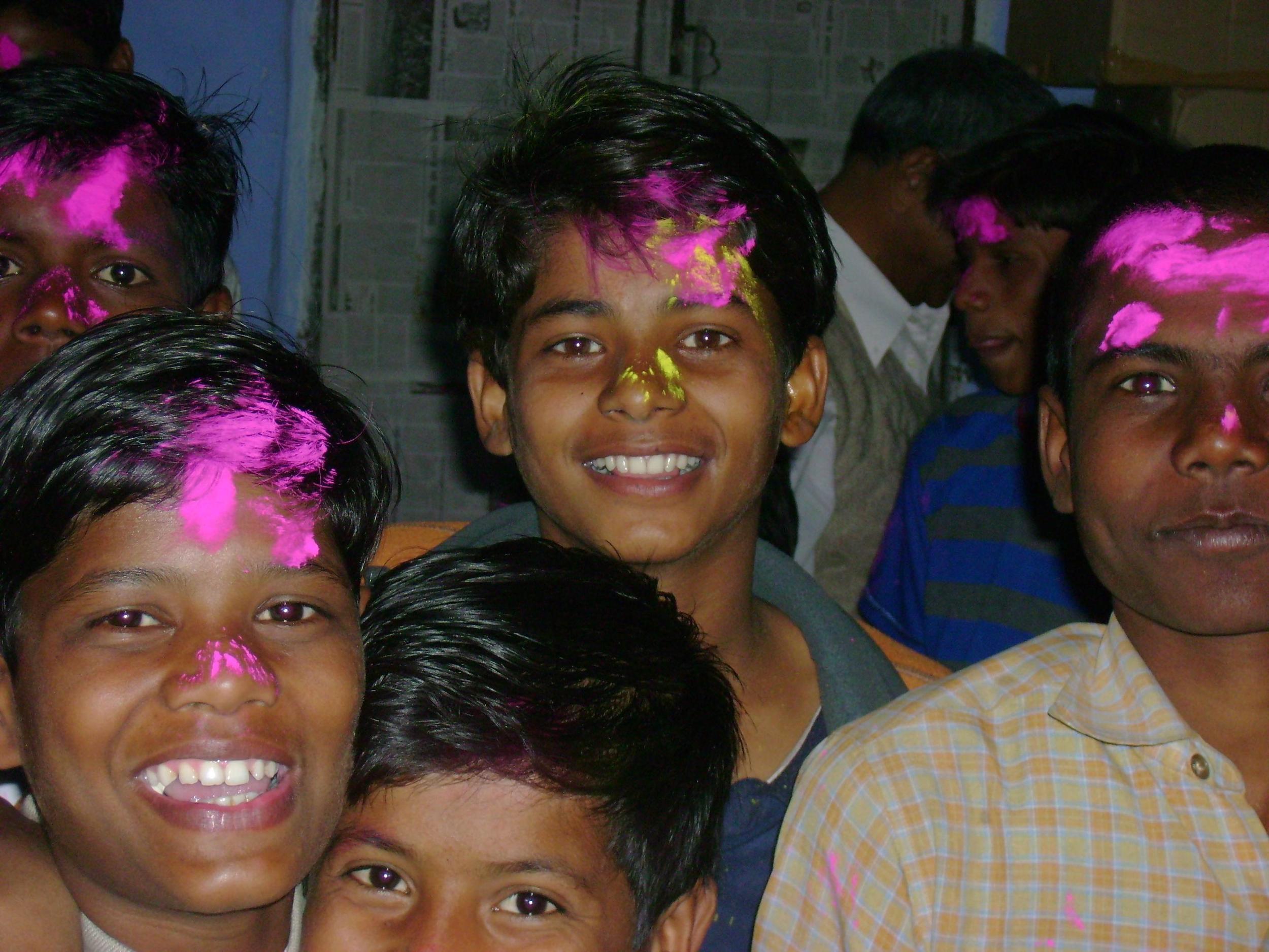 Boys from the Children of Mother Earth project celebrating the festival of Holi.