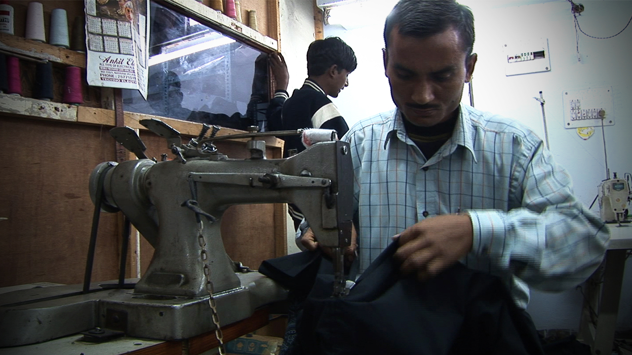 Tailoring apprenticeship. One of the many employment programmes run by COME for young adults