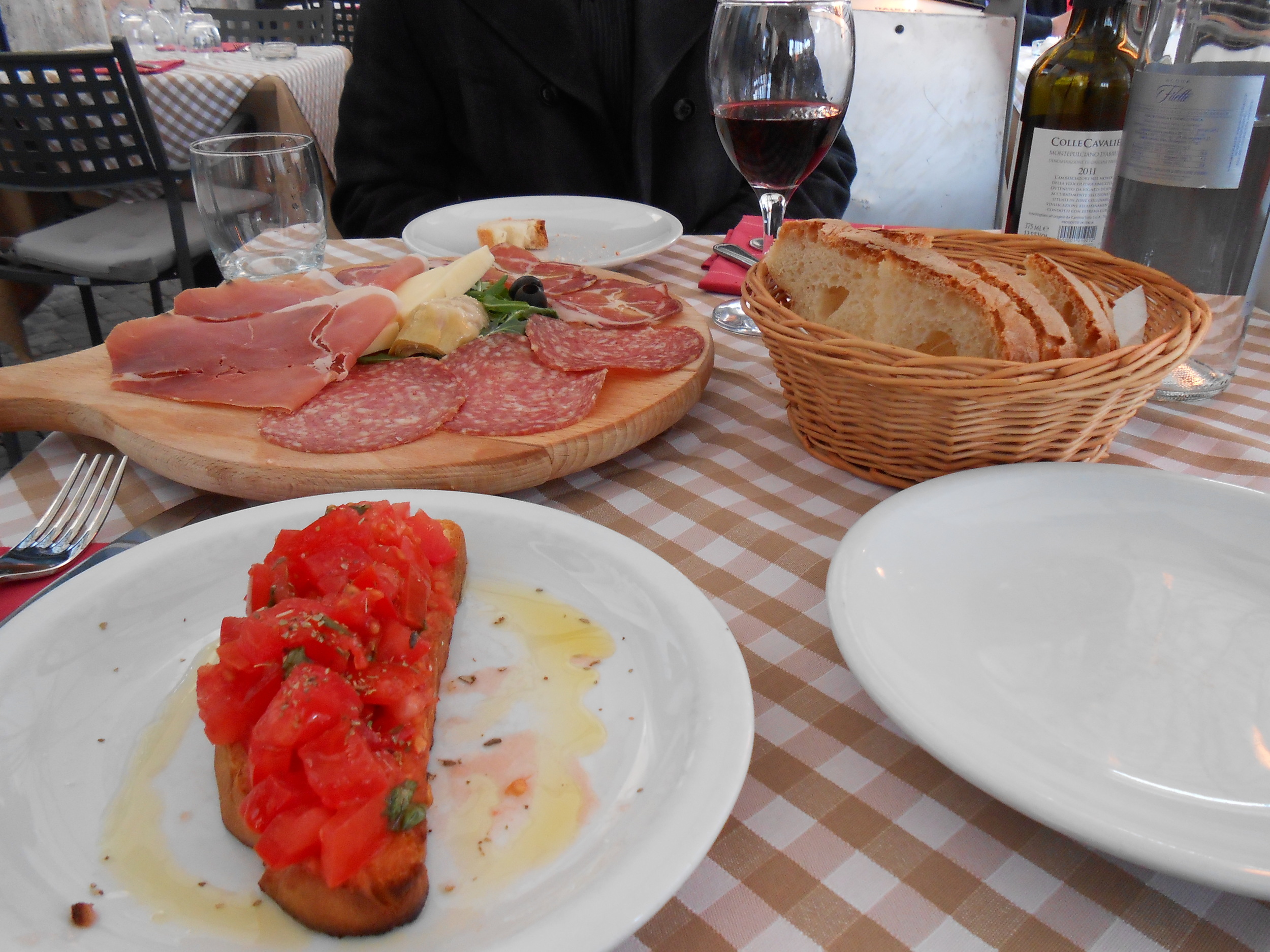 Enjoy a glass of wine along with some meats and cheeses in one of the many piazzas throughout the city.