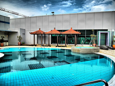 For a small fee, enjoy the beautiful pool deck, towel service and a non-alcoholic beverage.