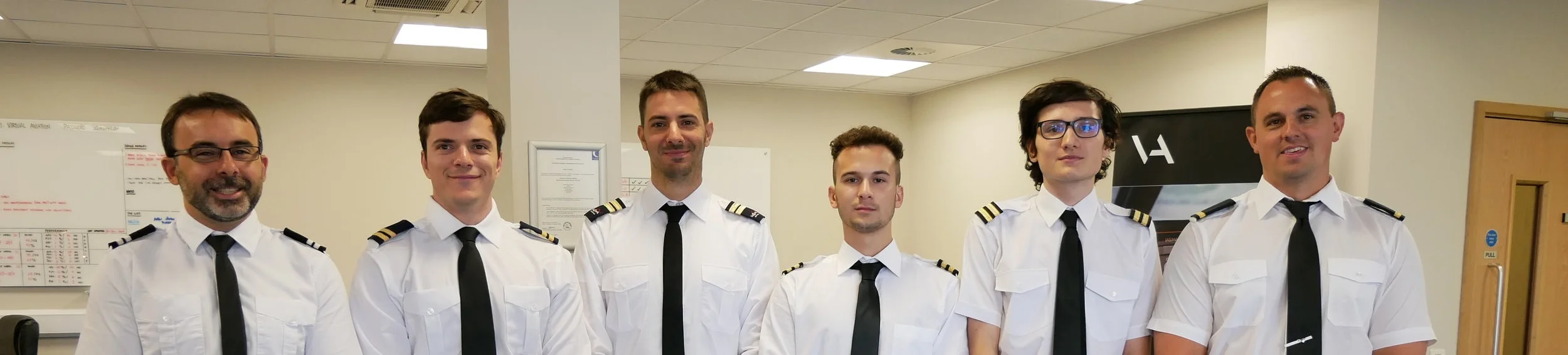 Graduates from APS MCC class 1815 who are now all flying commercially as first officers. From left to right, Martin (Flybe), Byron (Ryanair), Fabrizio (Ryanair), Simone (Ryanair), Massimiliano (Ryanair) and Aaron (Flybe),