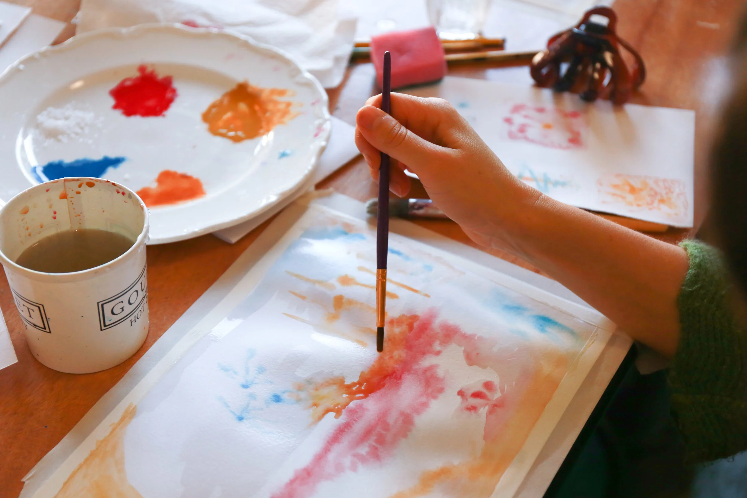 A student painting at one of my Mindful and Intuitive watercolour workshops. Photo by Julian Barford Photography.