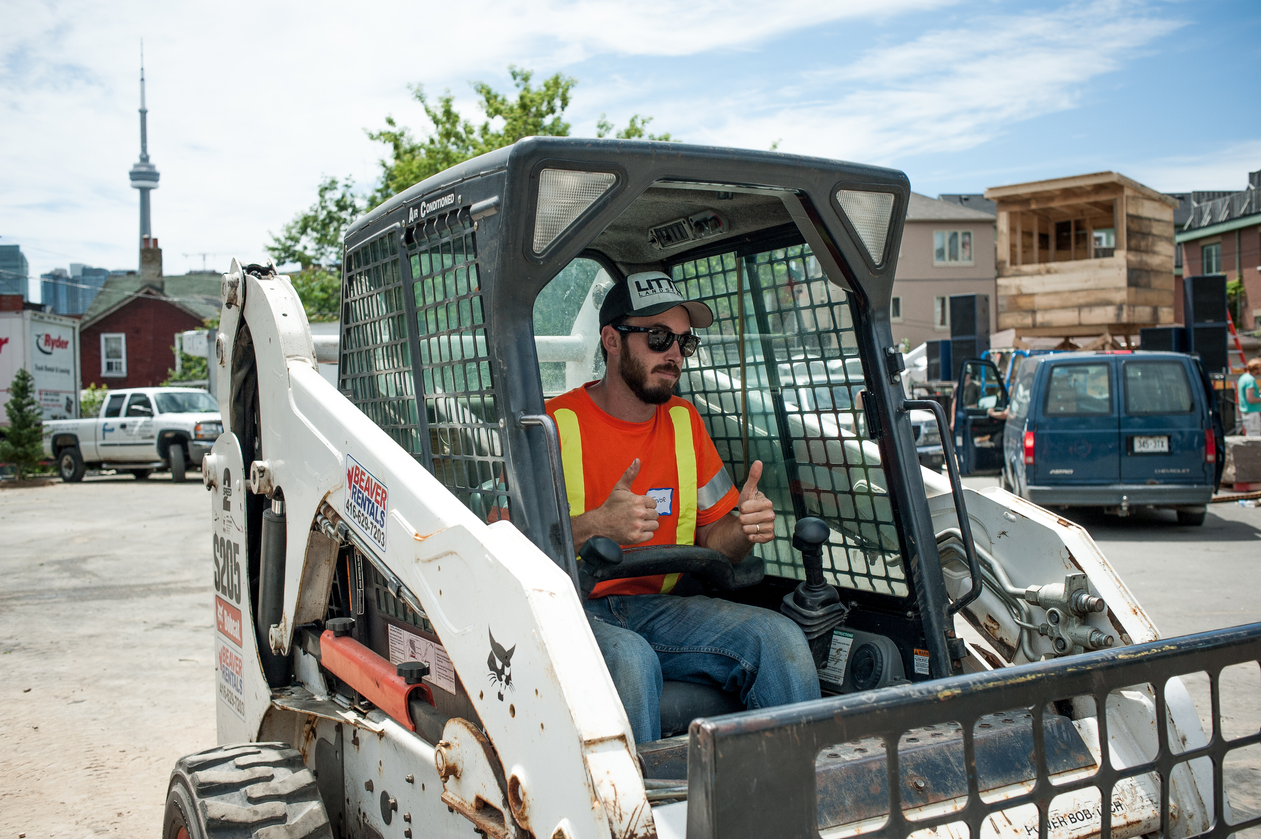 Trevor saying hello from his Bobcat. (More photos from this job to come later!)