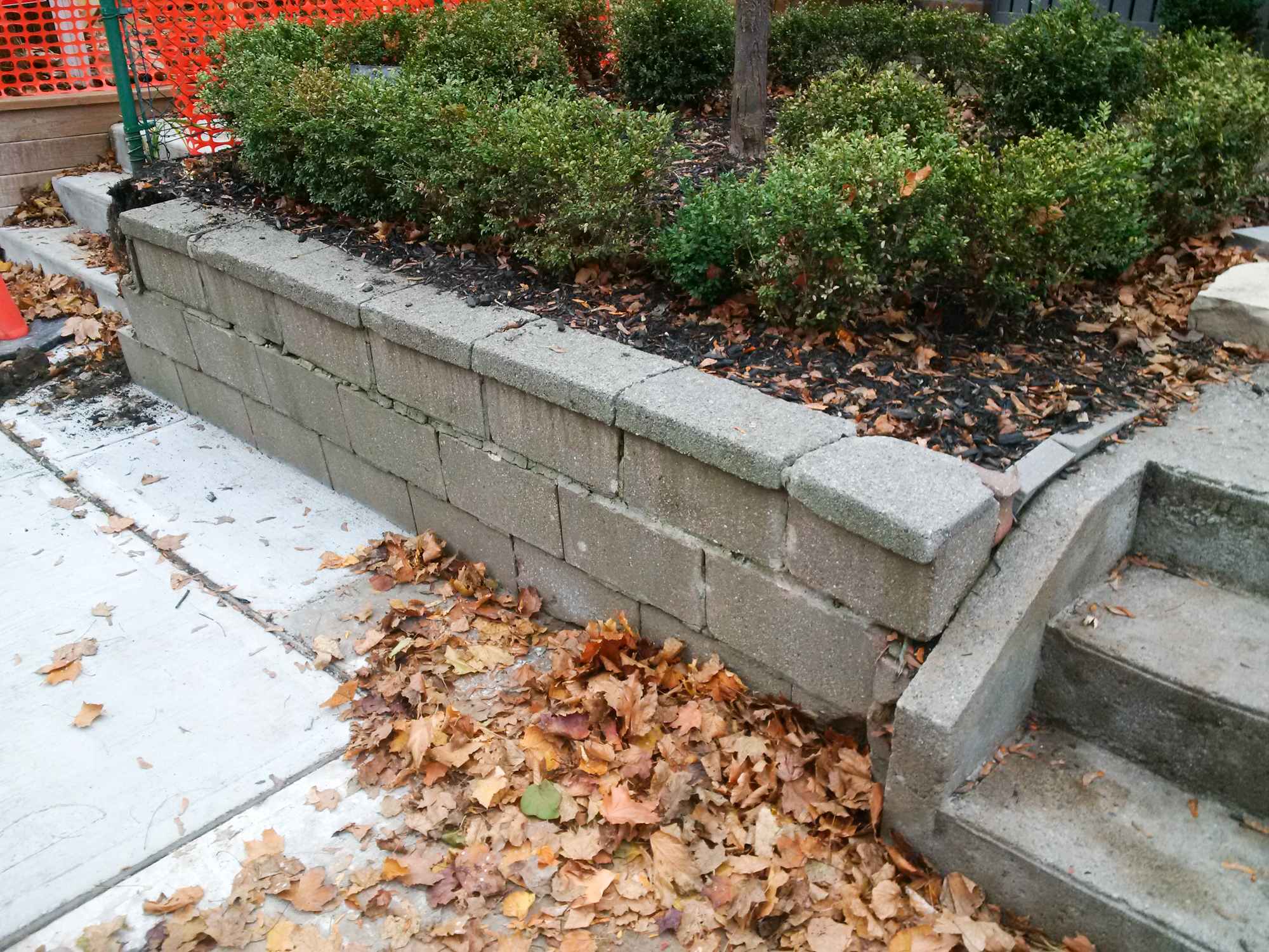 BEFORE: out of date cinder blocks created an eye sore.