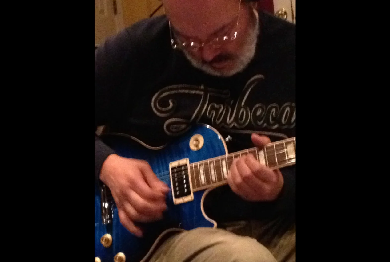 Peter Elizalde playing lead guitar on "Fantasy Lights" album