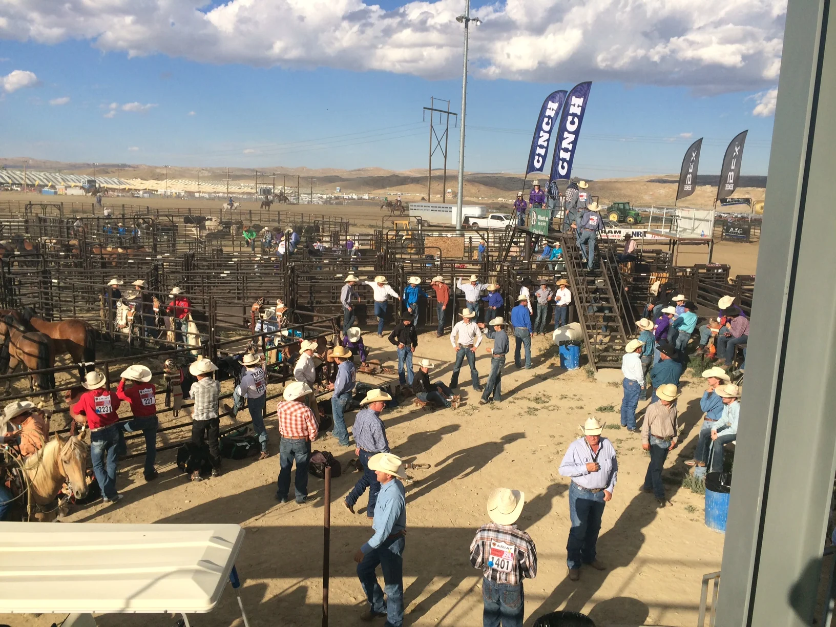 Here's the bareback crew getting ready just after our first "prayer behind the chutes" at the first performance. 