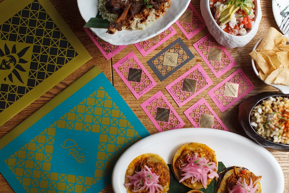 Print Materials, capturing the vibrant colors and papel confetti.