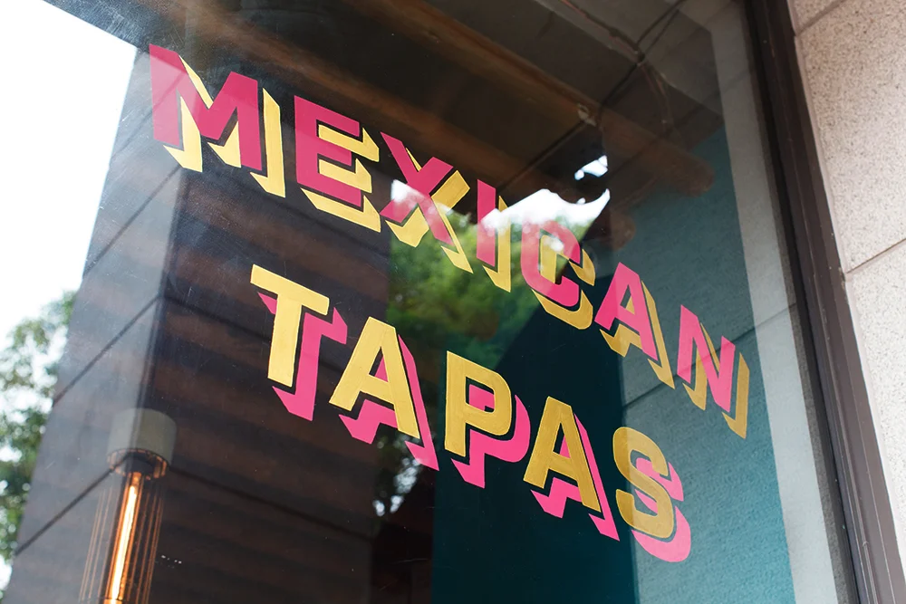 Interior Signage, hand painted with One-Shot enamel paint on glass.
