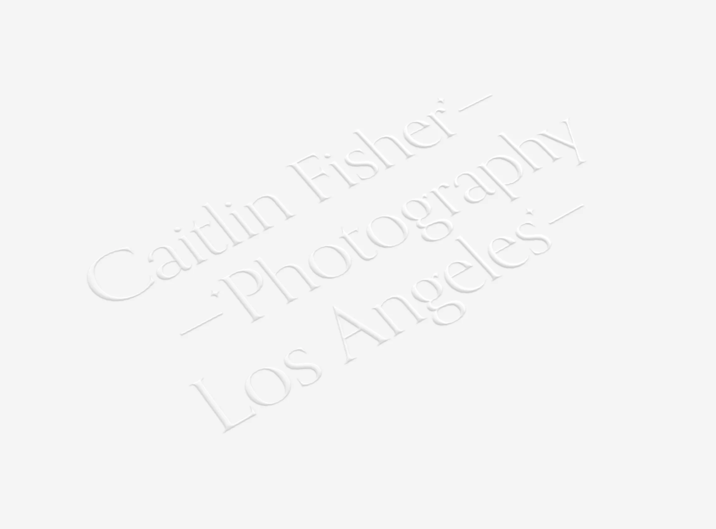 CaitlinFisher_EmbossLogo.jpg