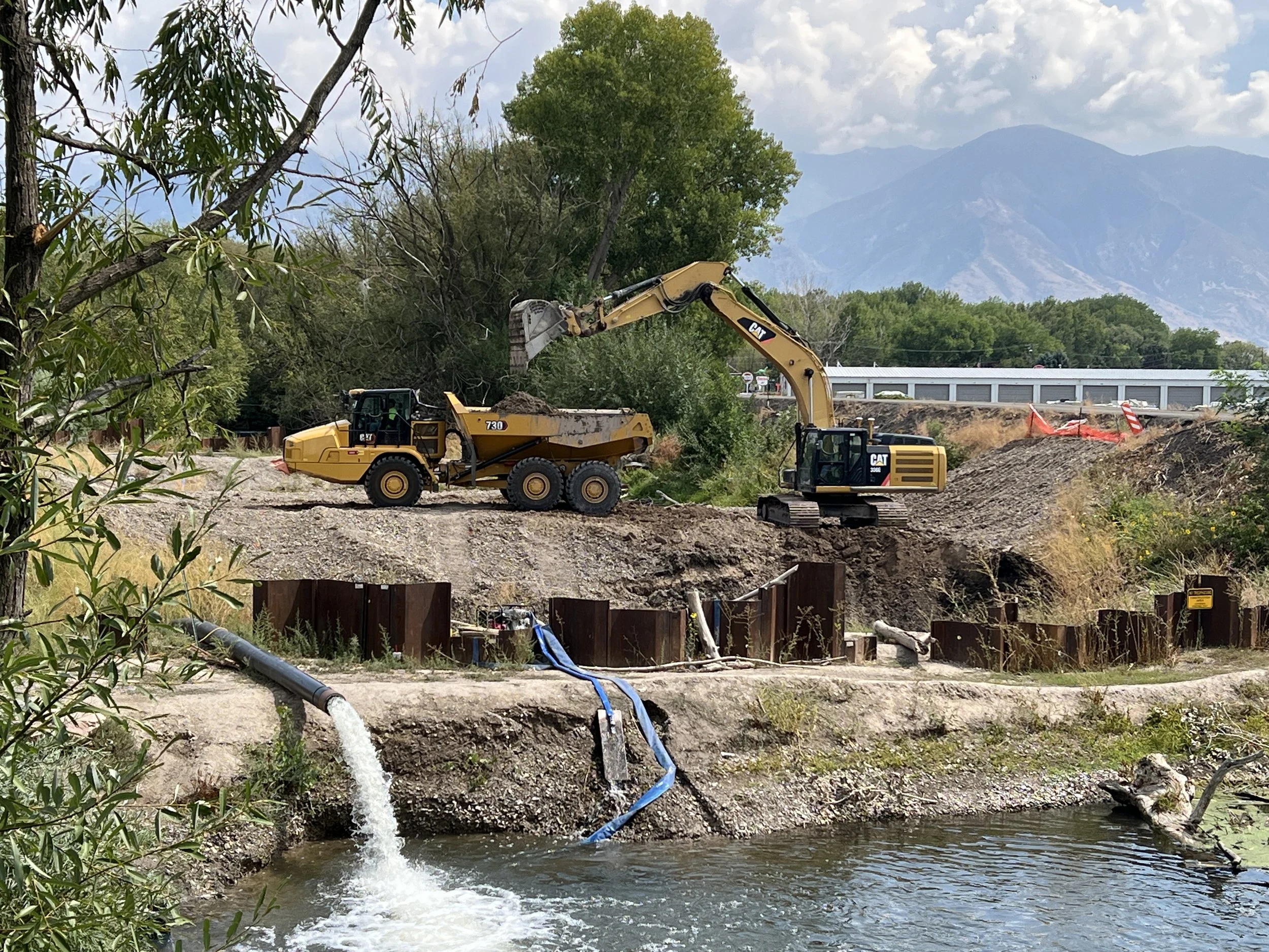 2-2025-08-28 Small Dam construction with pumped outflow visible.JPG