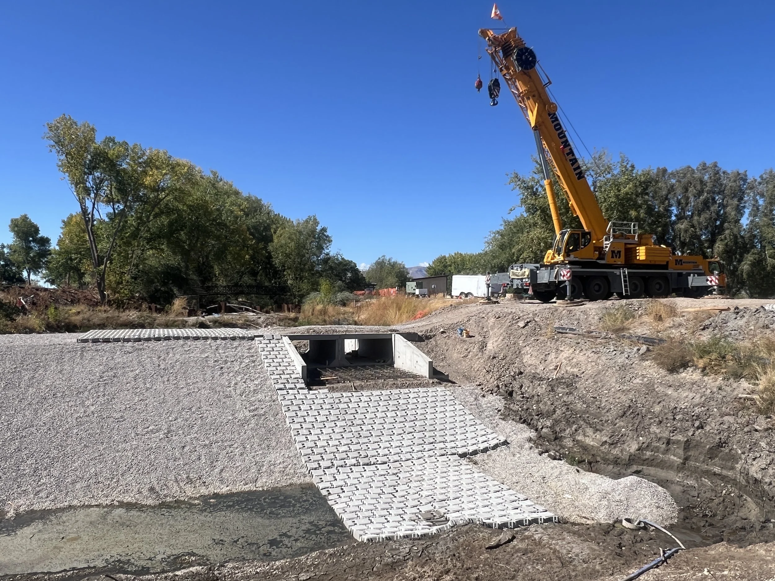 2025-10-1 small dam mat install from upstream looking west.JPG