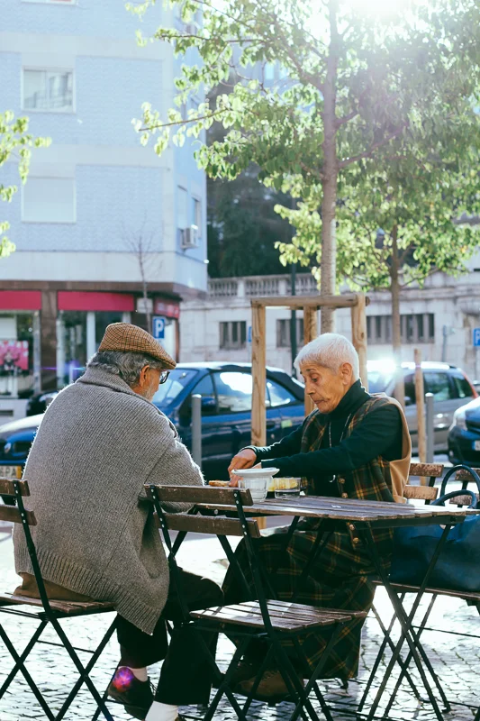 Old couple having coffee. Taken as I sat at a coffee shop to work. 