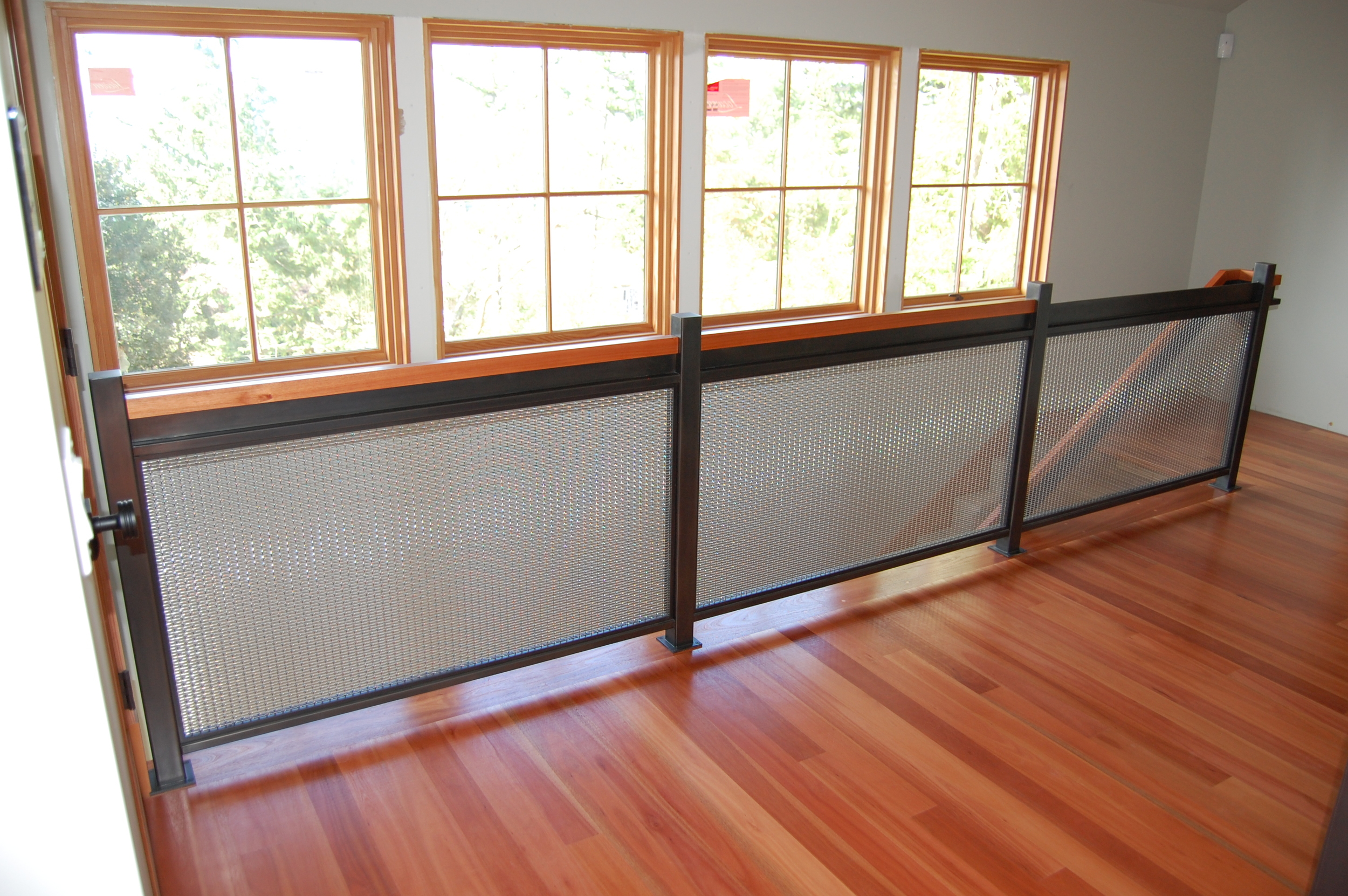  Blackened Steel Railing with Stainless Steel woven wire mesh  Designed by Formed Objects 
