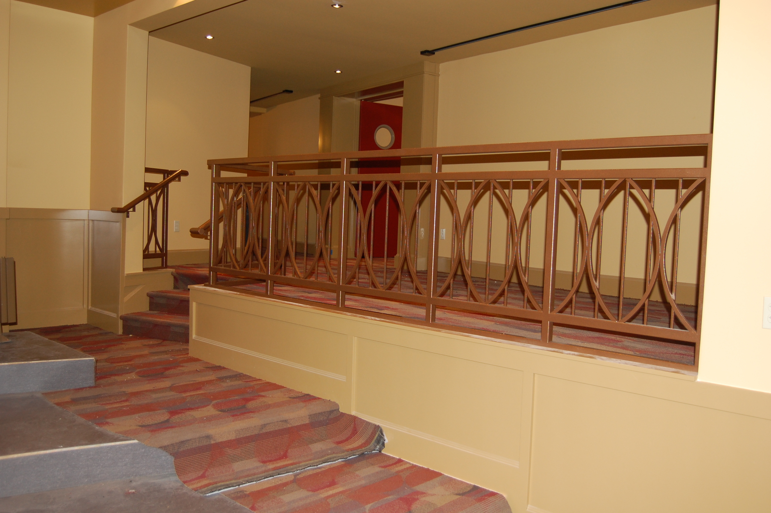  Painted steel railing for a home movie theater.  Designed by Group Jake Collaborative 