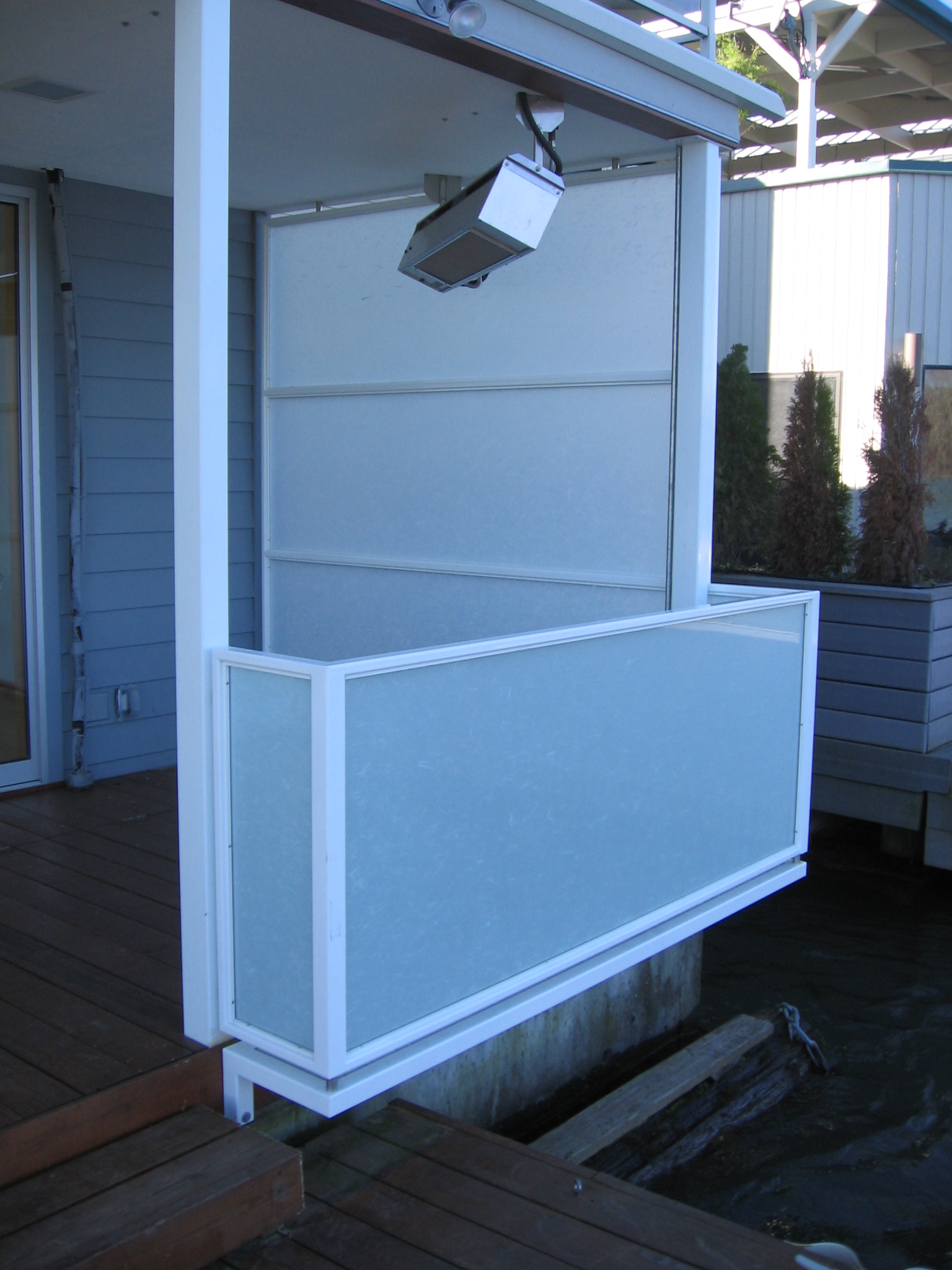  Painted steel guard rail and screen on this houseboat.  Designed by Greenline Fine Woodworking 