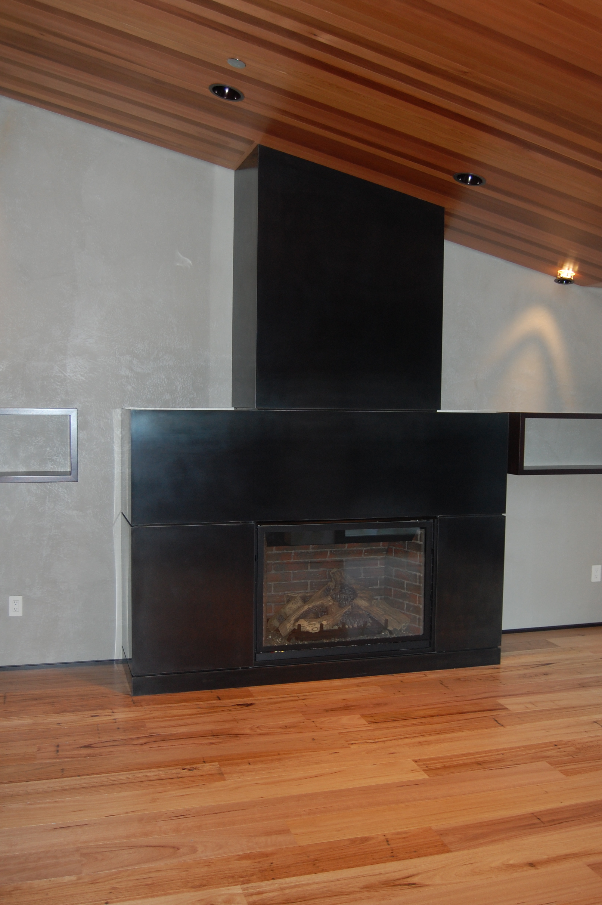  Fireplace Surround out of hot rolled steel.&nbsp;  Designed by Giulietti/Schouten Architects 