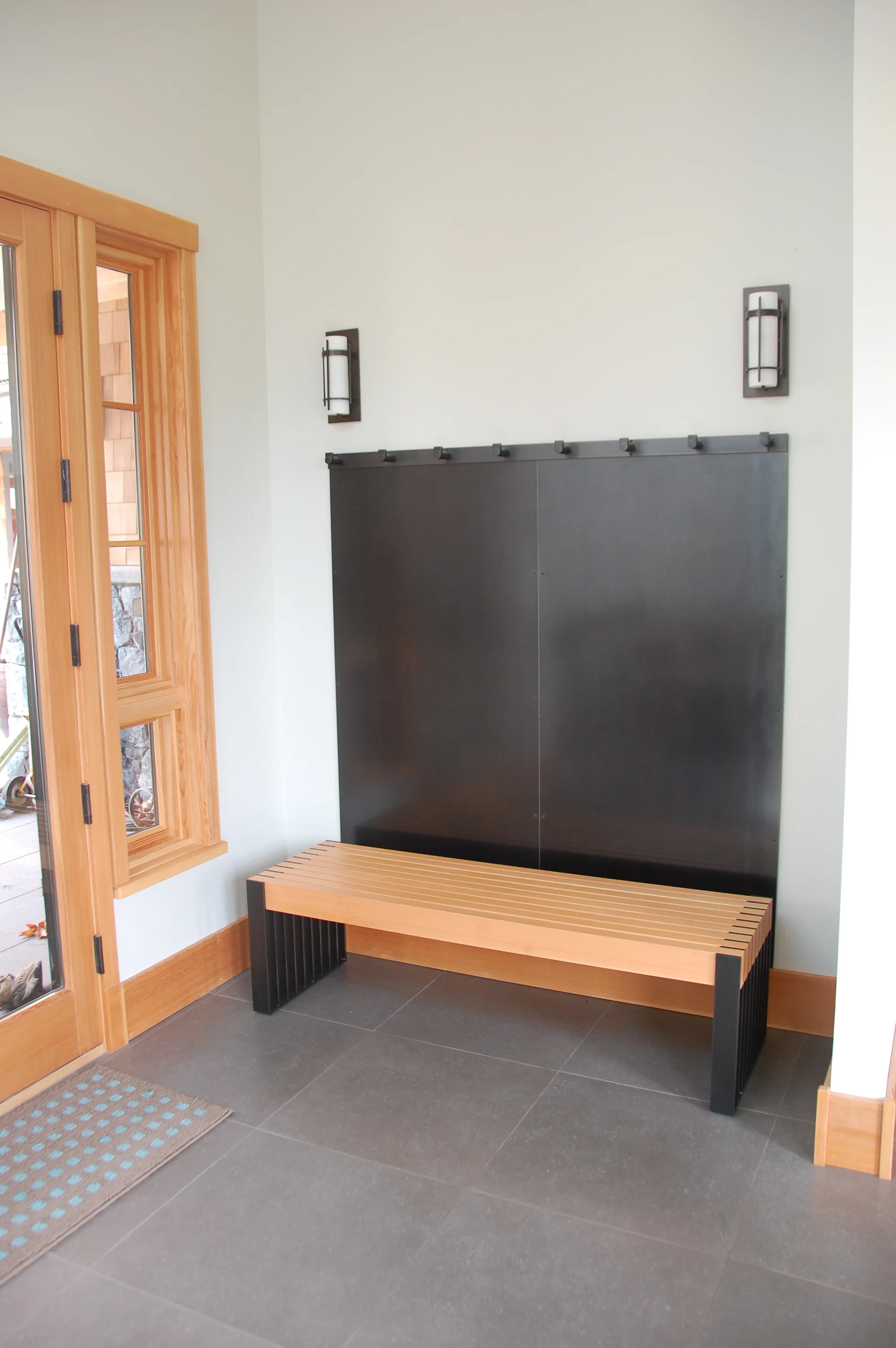 Coat Hooks, Cladding and Bench. Steel is hot rolled and cold rolled with patina. Bench top is Fir. Designed by Formed Objects