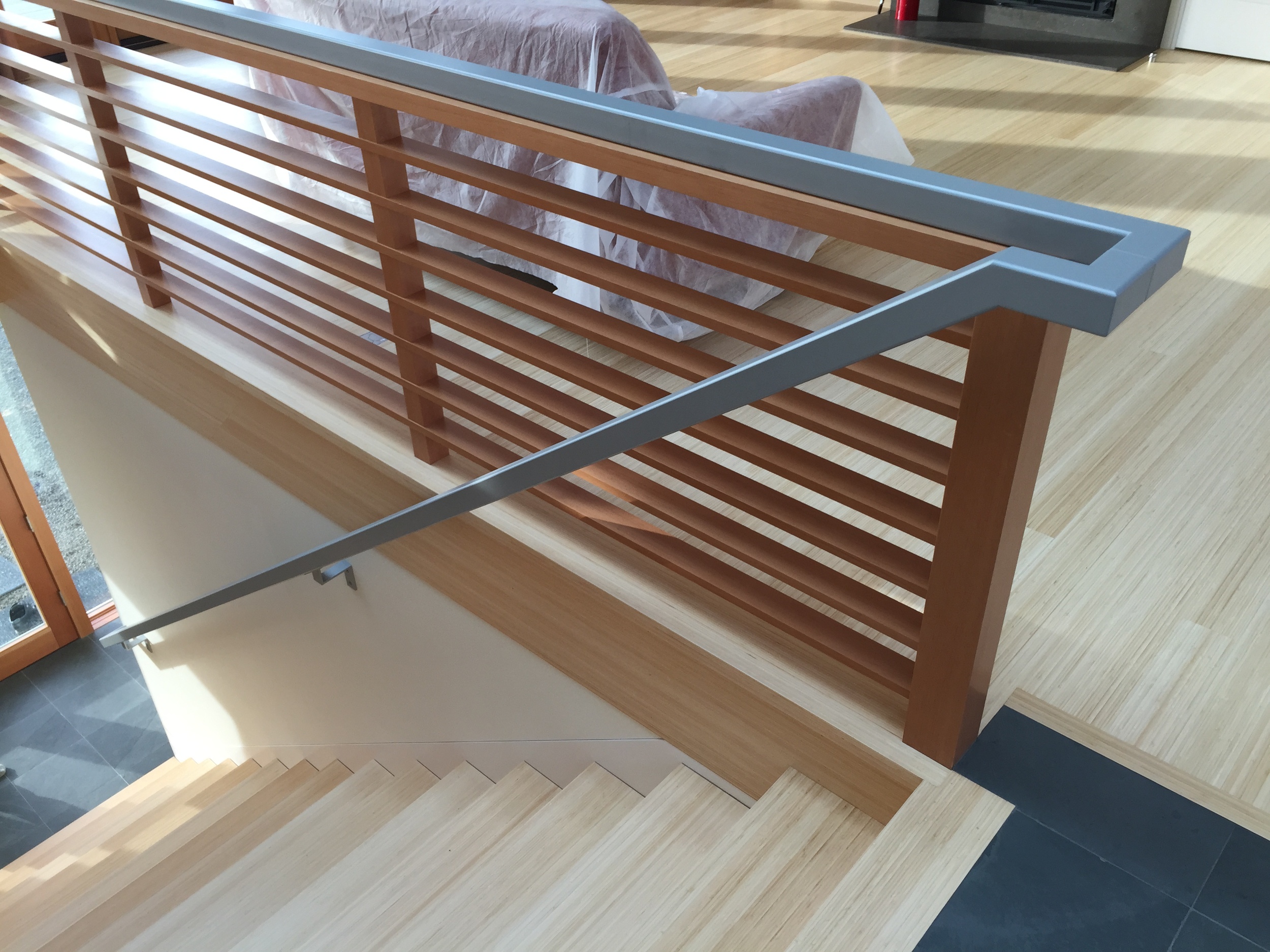  Steel grab rail. &nbsp;Wood done by Green Gables Construction  Designed by Pete Retondo Architecture 