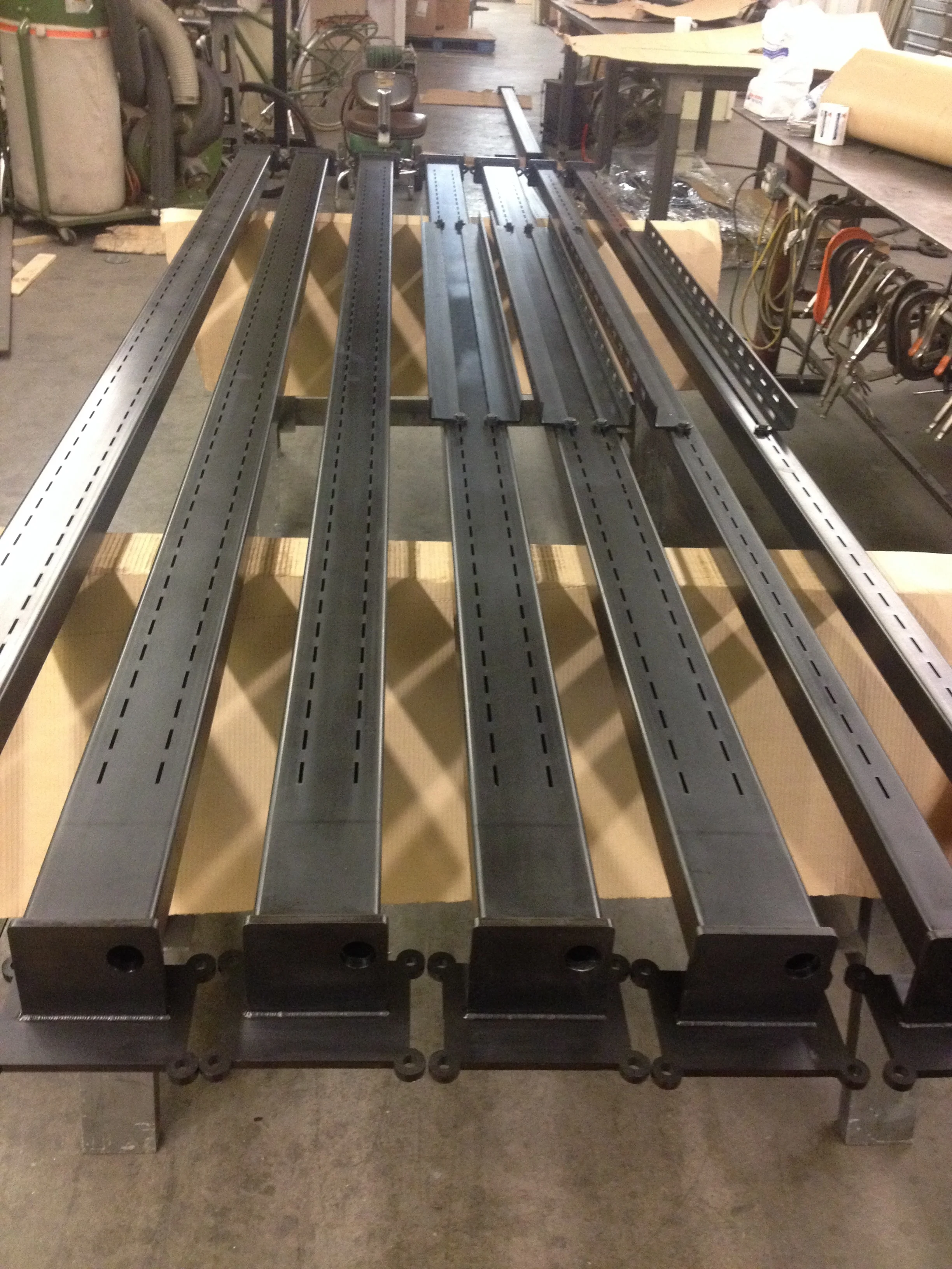 Custom adjustable shelving standards for two Danner Boot stores. Provided shelves that keyed into the standards. Designed by Danner Boots