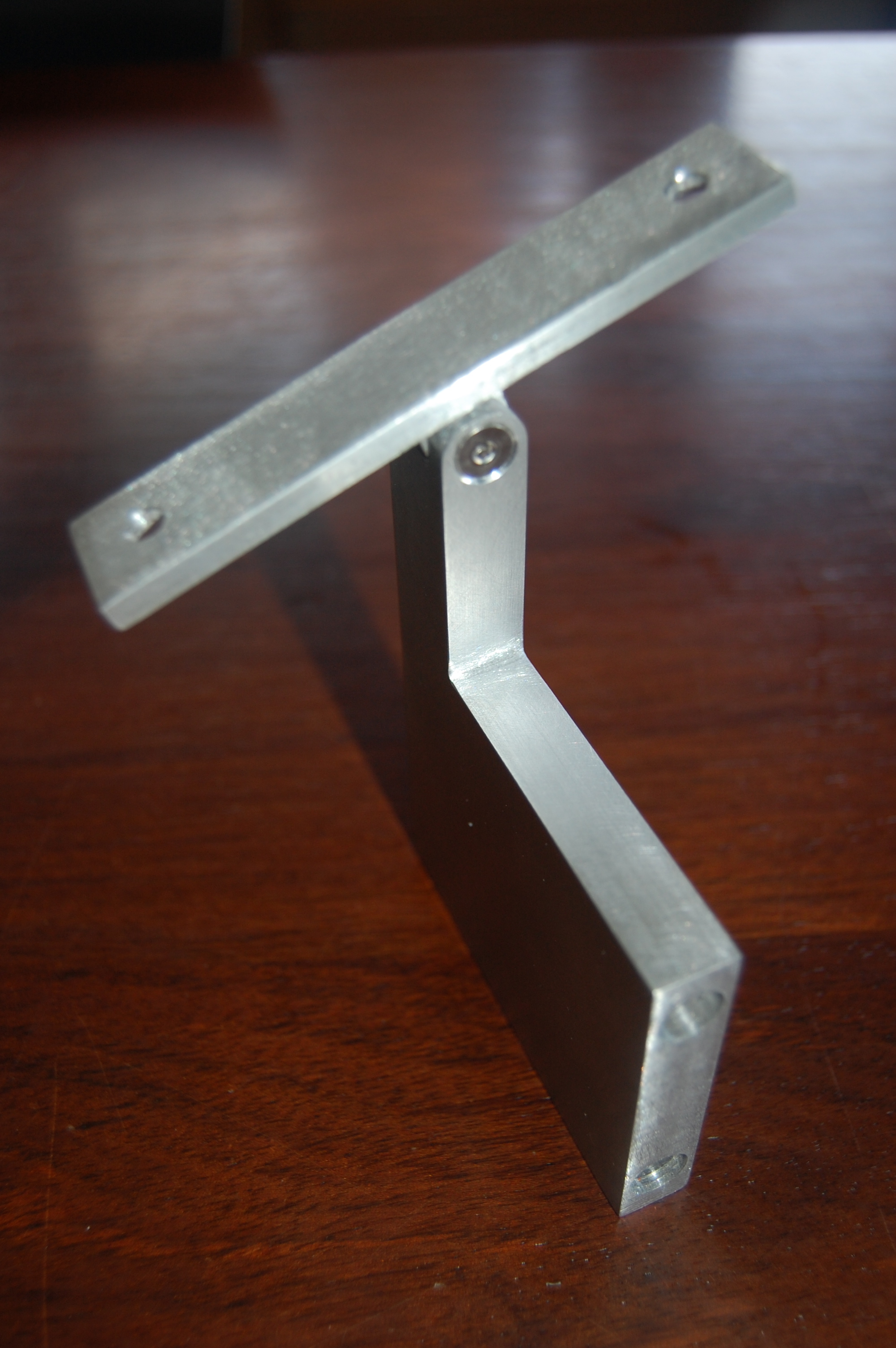  Adjustable pitch grab rail bracket out of aluminum.  Designed by Formed Objects 