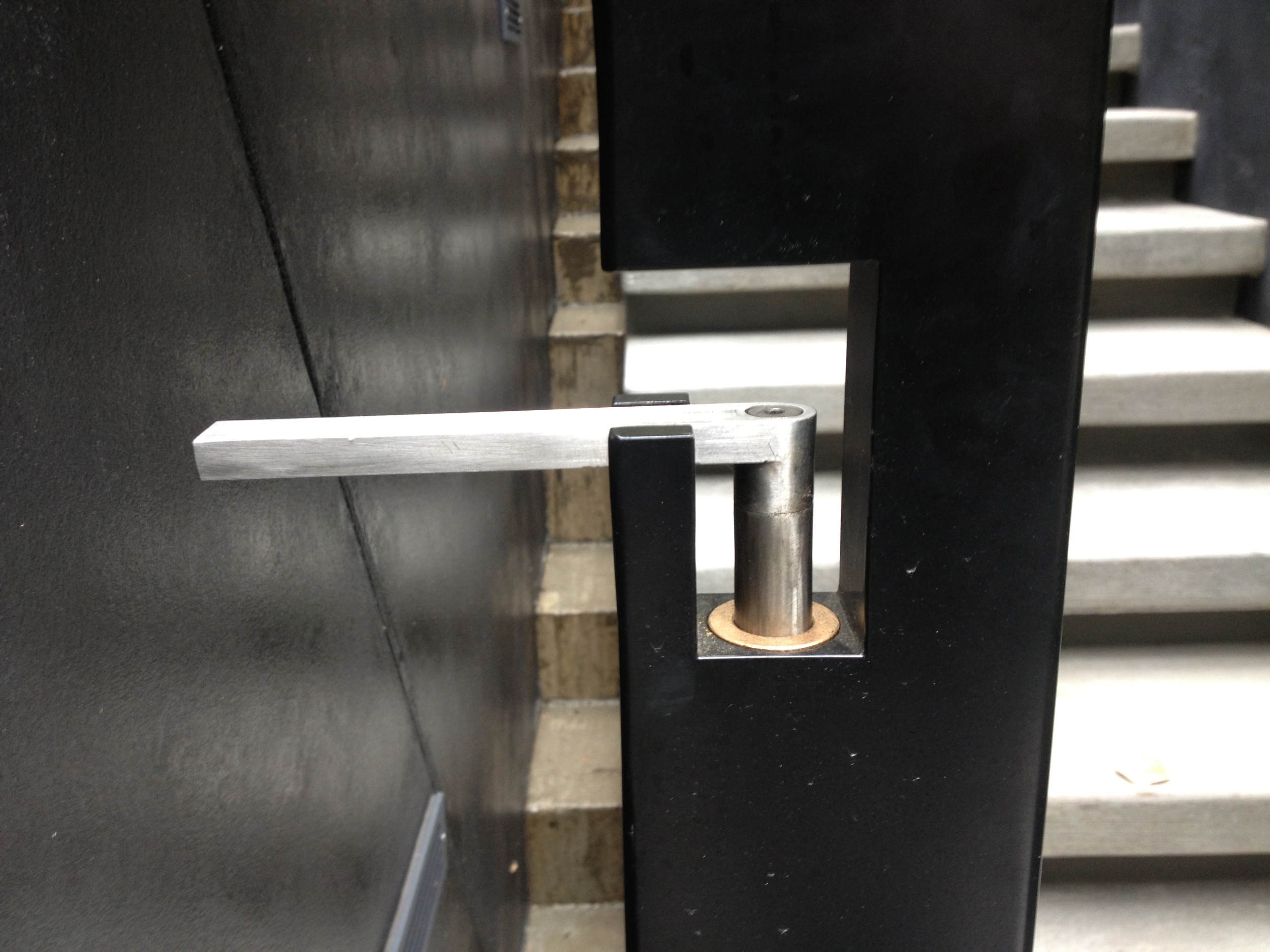  Gate with stainless steel handle that doubles as a cane bolt. Bronze bushing for long term no maintenance movement.  Designed by Skylab Architecture/Formed Objects 