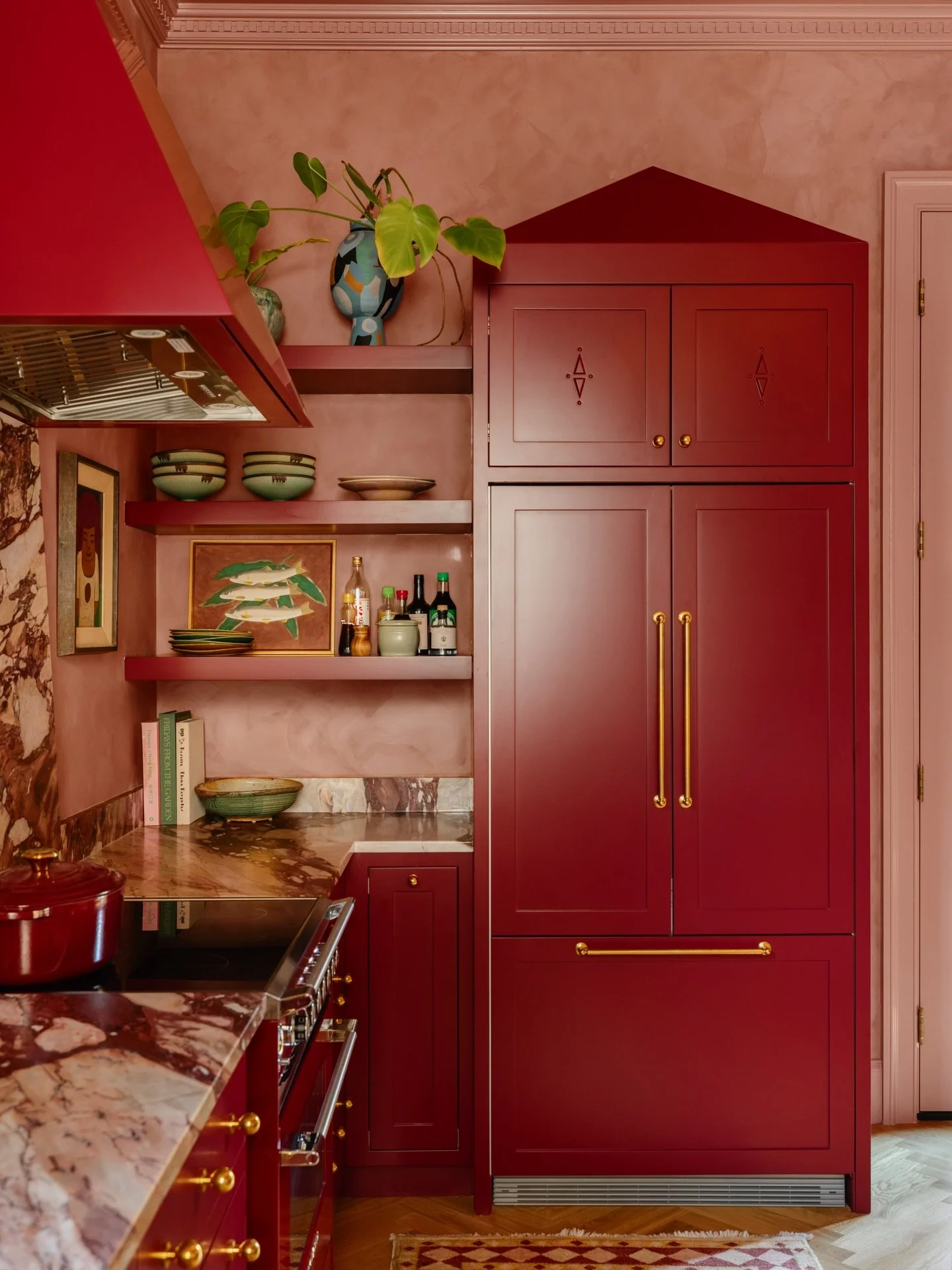 Let me show you this corner of the kitchen. I love the challenge of making a utilitarian space feel entirely custom. I wanted the refrigerator to feel like a bespoke piece of furniture rather than an appliance. We went with panel-ready doors, a custo