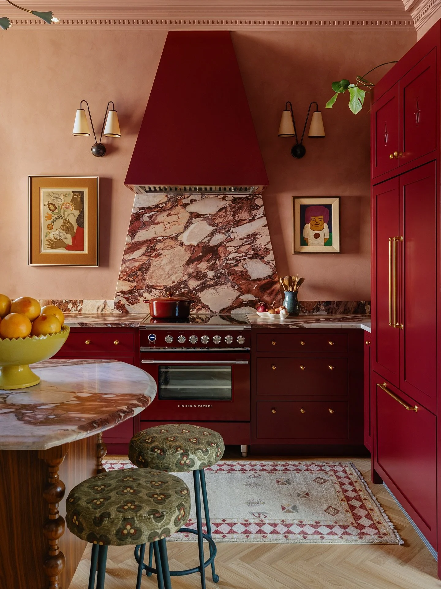 Let&rsquo;s mosey back into the kitchen! I originally designed this space with yellow cabinets back in 2023, but I quickly realized the colors were giving a bit of USC energy. Swipe to see the rendering. 

To pivot, I went for a monochromatic red mom