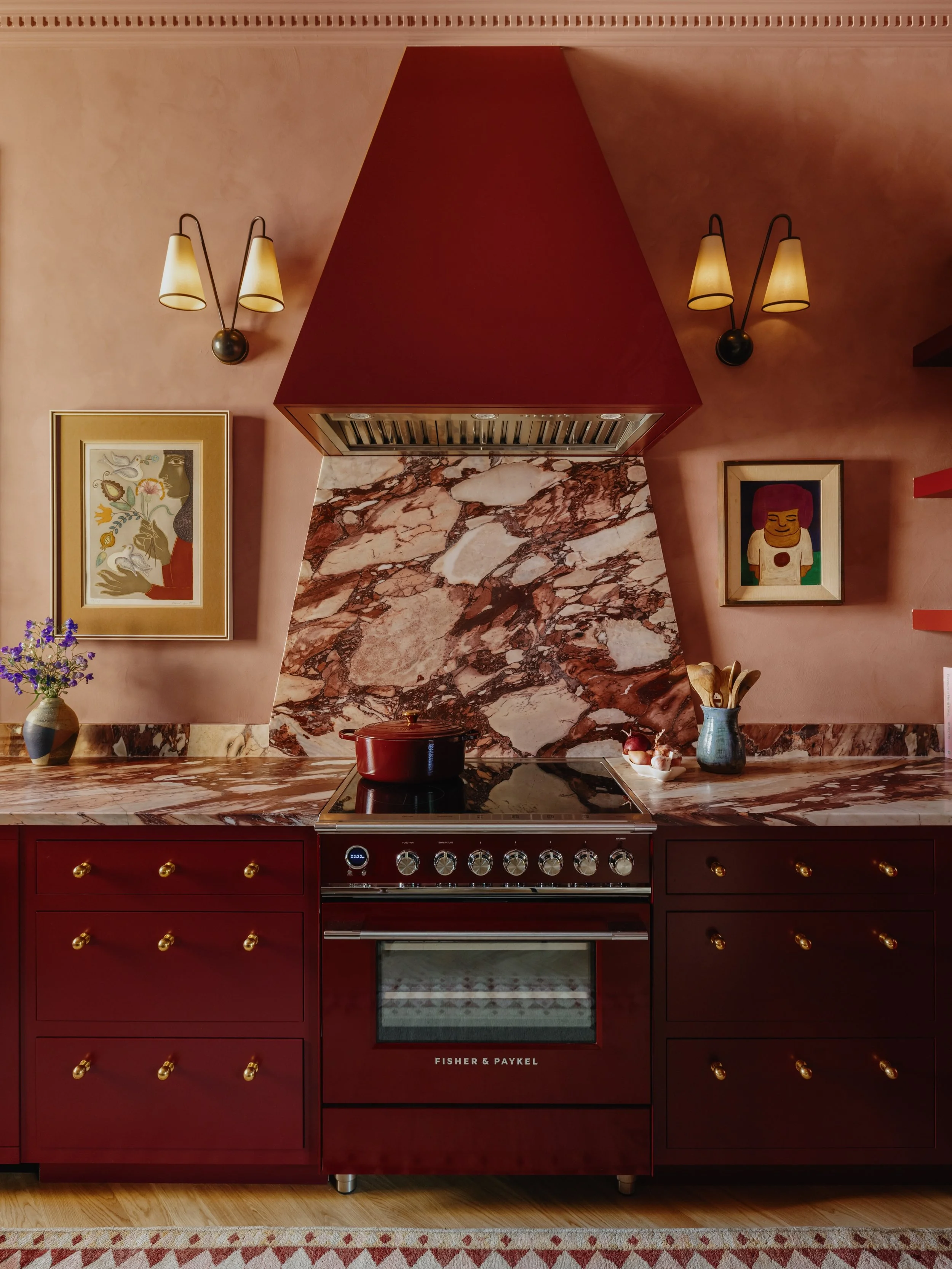 A closer look at how the light plays in this kitchen. The walls completely shift the mood depending on the time of day, moving from a dusty Marrakech blush to a peachy sorbet. The lime wash creates such a beautiful backdrop for the hood and backsplas