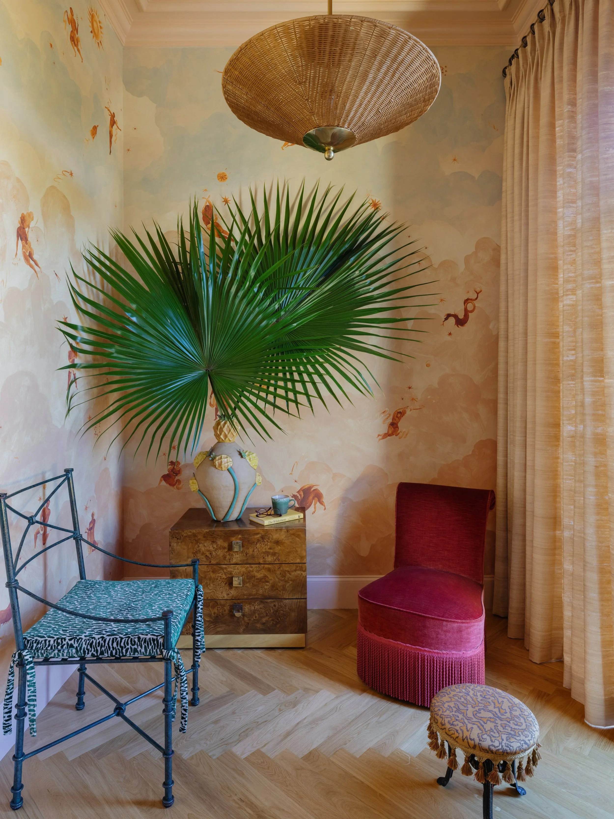 I transformed my bedroom nook into a little dreamy corner for me and Verbena. I knew I wanted to use wallpaper from @backdrop, and &lsquo;Ascendance&rsquo; in Dusk was the perfect match for our peachy tones. Between the clouds and the Greek goddesses