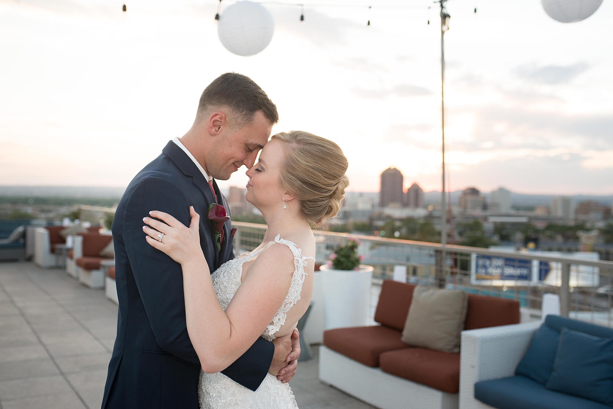 Wedding dress Ann Matthews, jewelry by helzberg diamonds, suits by suits unlimited, hotel parque central wedding photographed by albuquerque wedding photographer kayla kitts rooftop wedding