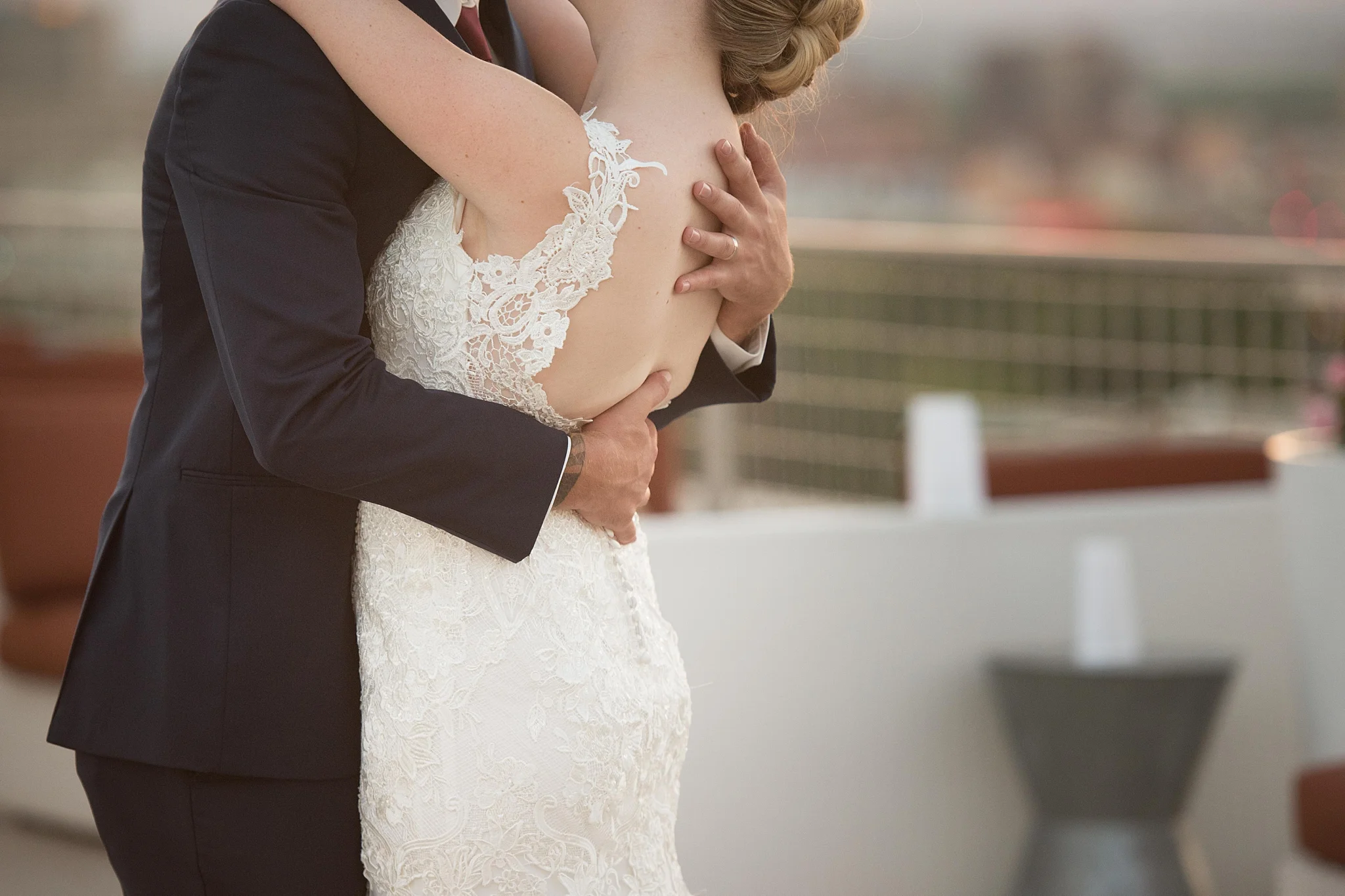 Wedding dress Ann Matthews, jewelry by helzberg diamonds, suits by suits unlimited, hotel parque central wedding photographed by albuquerque wedding photographer kayla kitts rooftop wedding
