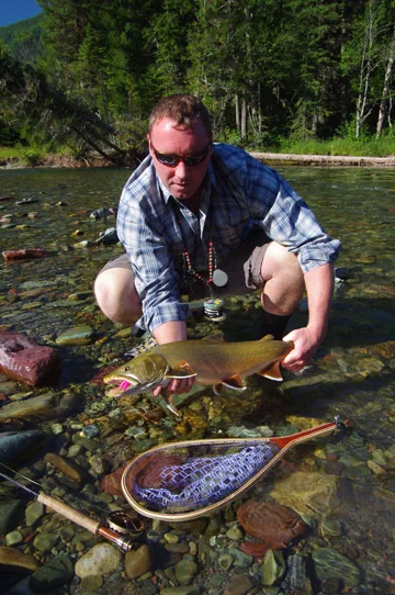 A Wigwam River Bull caught in crystal clear waters
