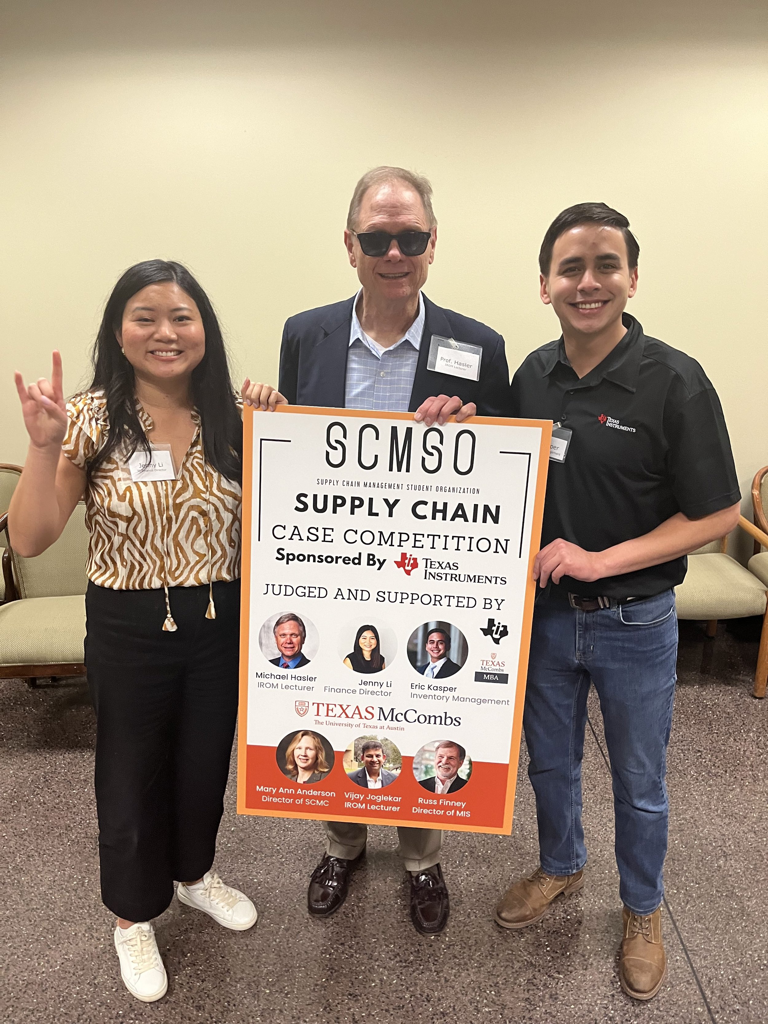 Dr. Hasler and TIers Jenny Li and Eric Kasper after judging Case Competition