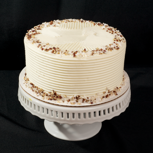 Italian Cream Two layers of almond cake with chopped pecans and coconut. Filled and iced with almond butter cream and topped with chopped pecans and coconut. 6" (serves 8): $30 | 8" (serves 15): $45 | 10" (serves 25): $57 12" (serves 35): $76 | half-sheet (serves 55): $95 Available year round