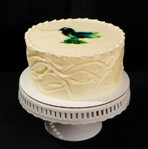 Hummingbird Banana pineapple pecan spice cake with cream cheese frosting. 6" (serves 8): $31 | 8" (serves 15): $45 | 10" (serves 25): $65 12" (serves 35): $90 | half-sheet (serves 55): $115 Available Year round