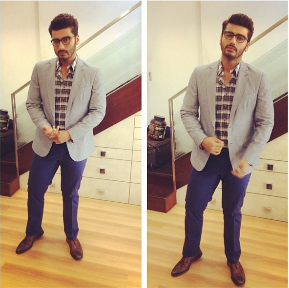 Arjun Kapoor in Burberry trousers, shirt & Jacket from The Collective and Emanuel Strazzi spectacles